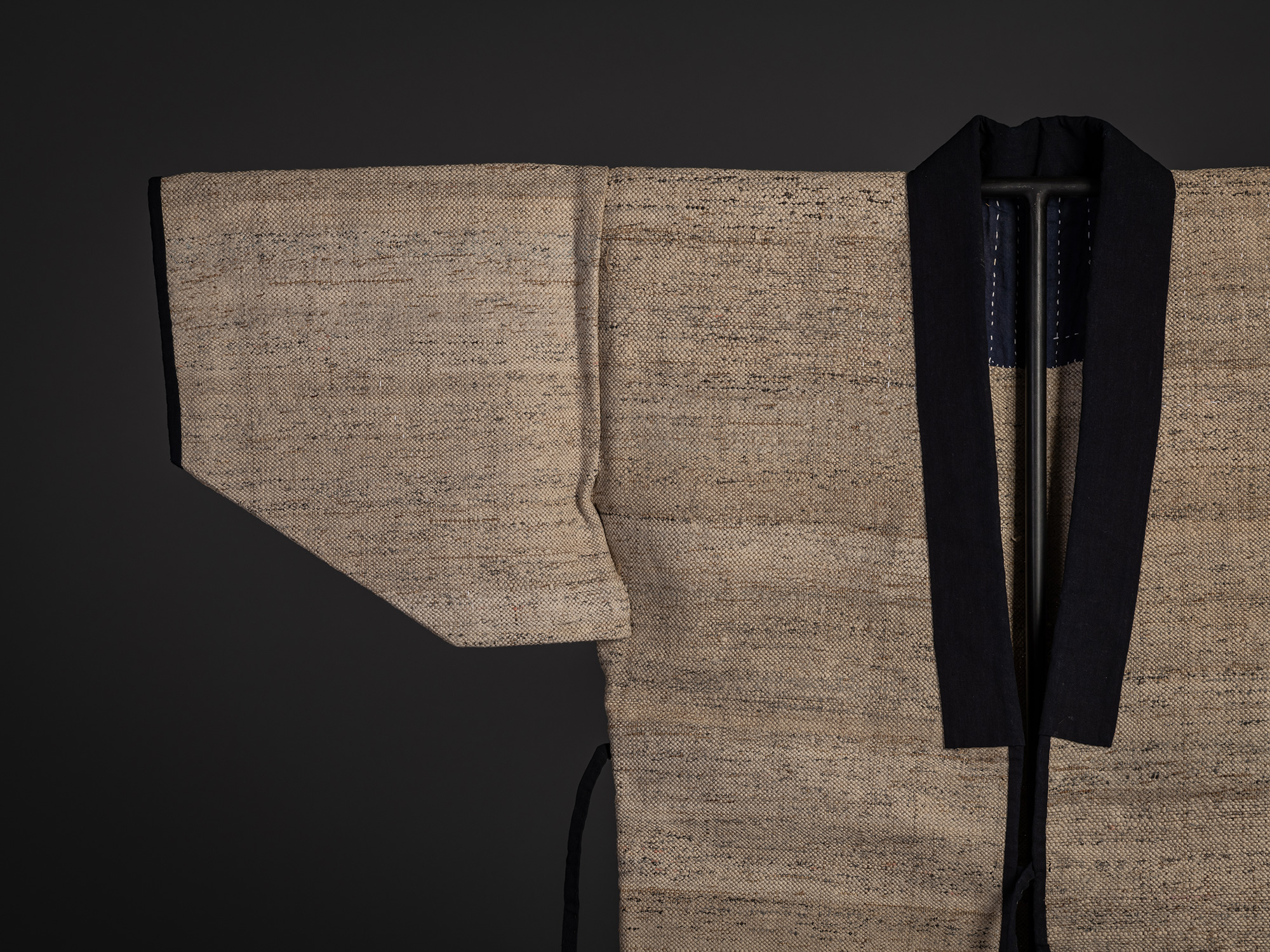 Detail view of the upper front section of a Japanese ōtsuzure hanten woven from wisteria yarn and...