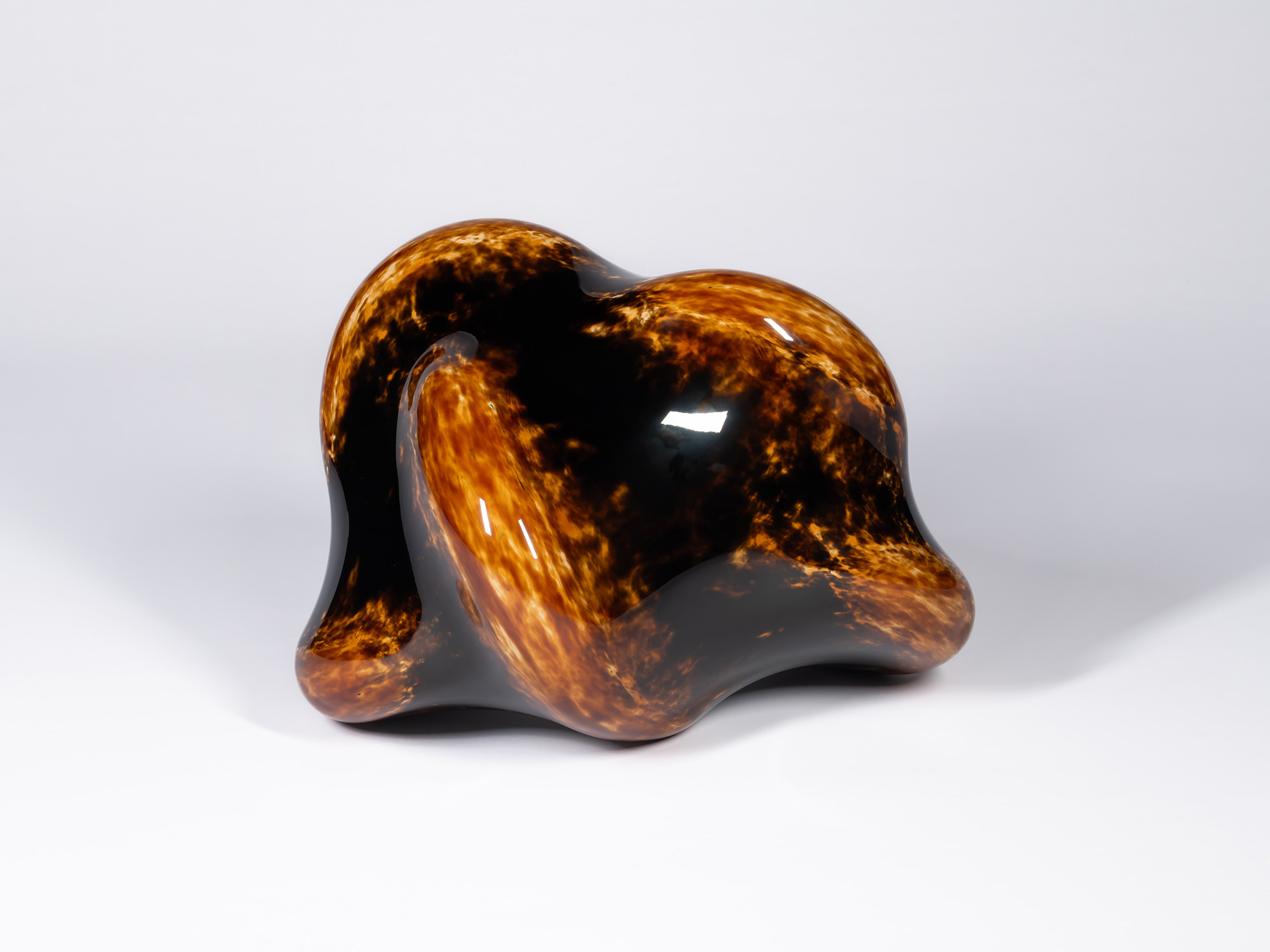 A freestanding lacquer sculpture titled Taxis Groove - Soft Ridges by Genta Ishizuka, photographed...