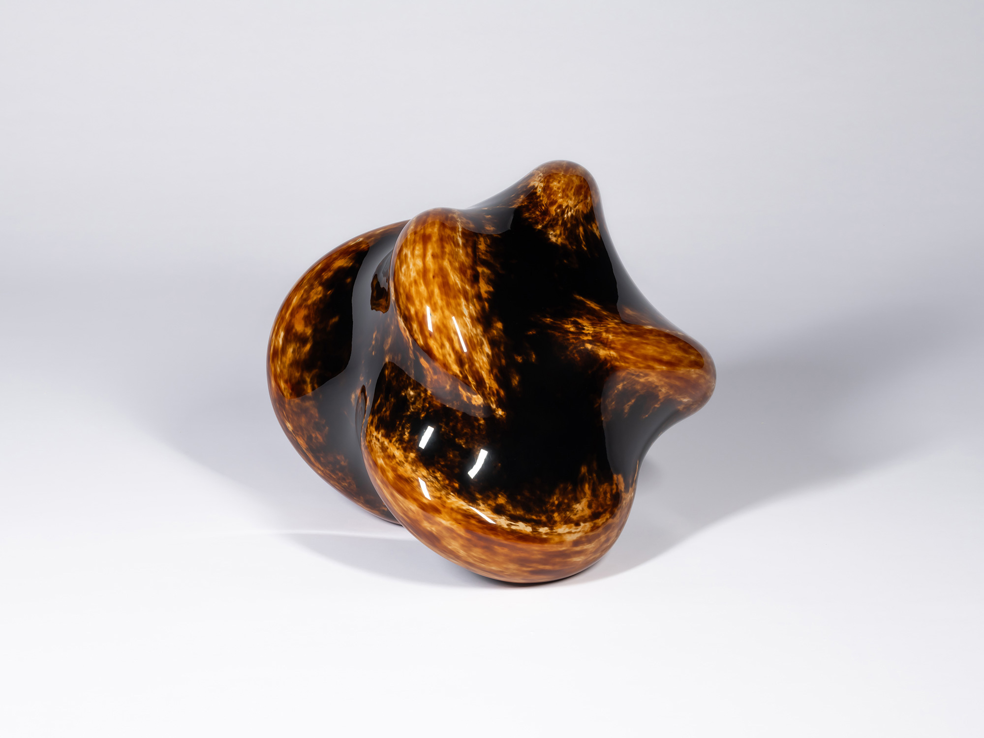 A freestanding lacquer sculpture titled Taxis Groove - Soft Ridges by Genta Ishizuka, photographed...