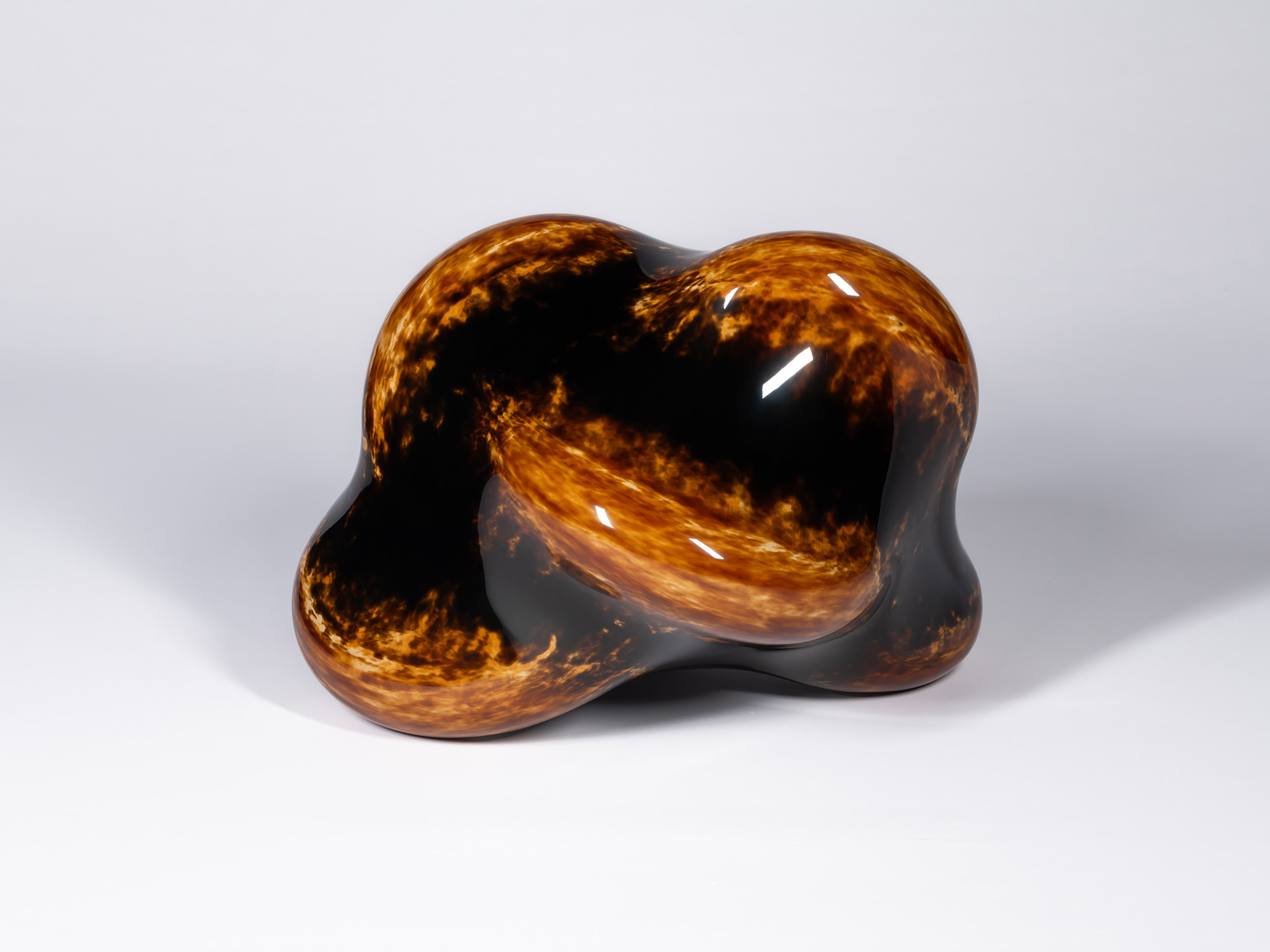 A freestanding lacquer sculpture titled Taxis Groove - Soft Ridges by Genta Ishizuka, photographed...