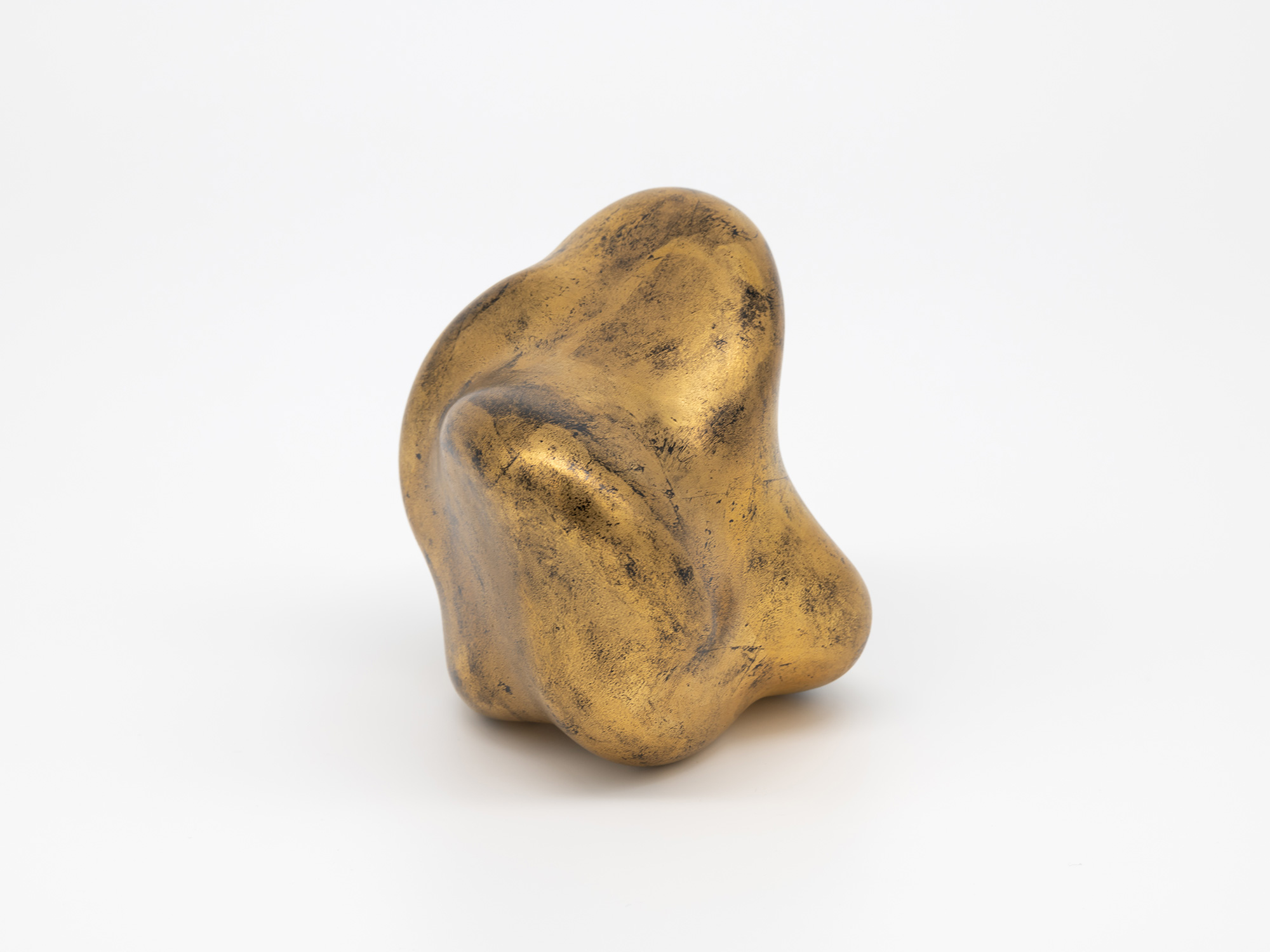 A small, freestanding contemporary lacquer sculpture titled Untitled (faded-gold) by Genta Ishizuka,...