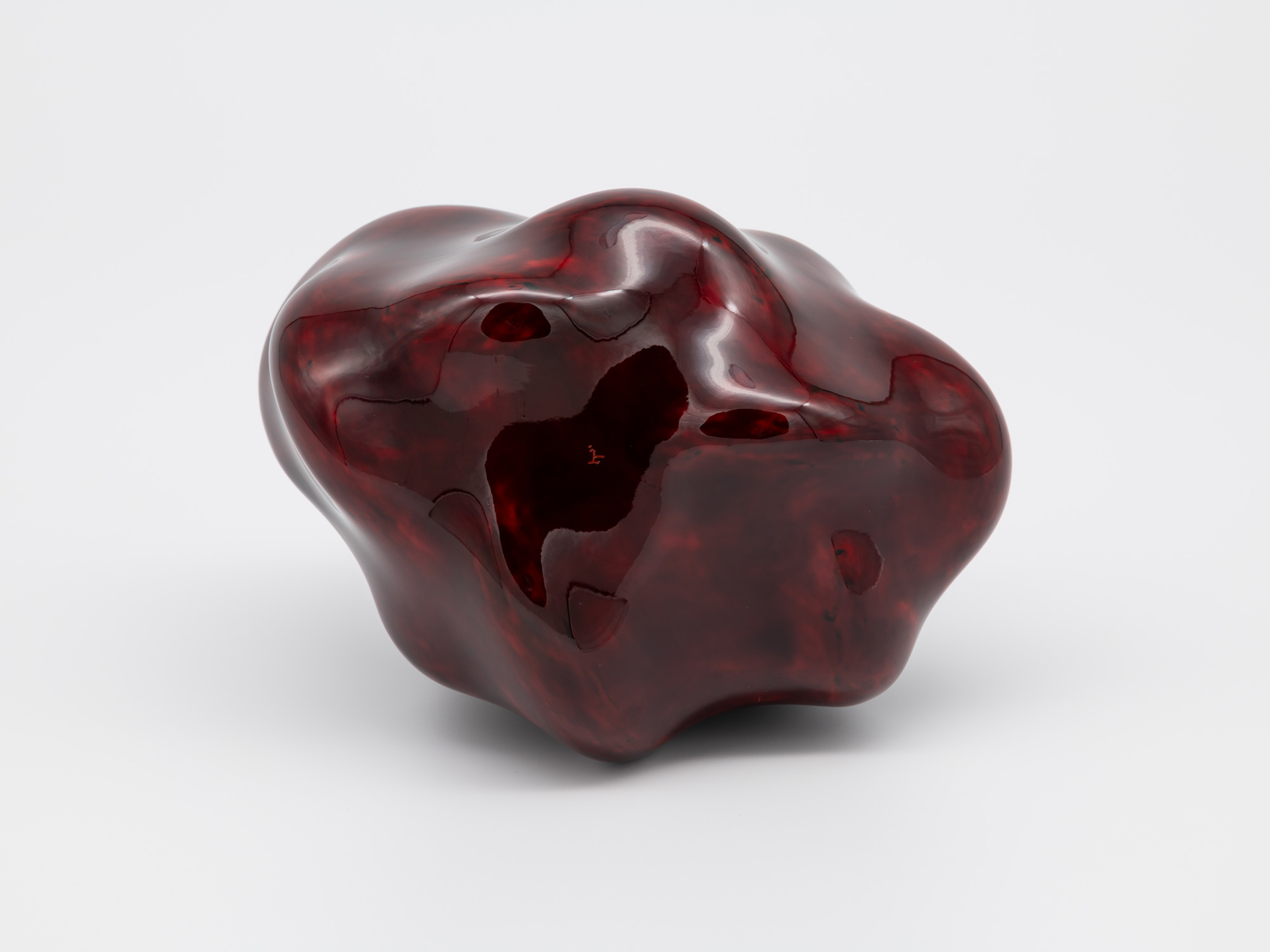 The underside view of Genta Ishizuka's freestanding lacquer sculpture Untitled (tangled), showing...