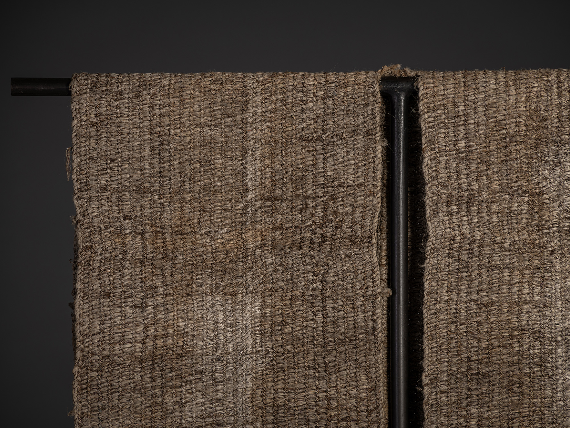 Close-up of the upper front section of the angin sodenashi, showing the densely woven bast-fiber...