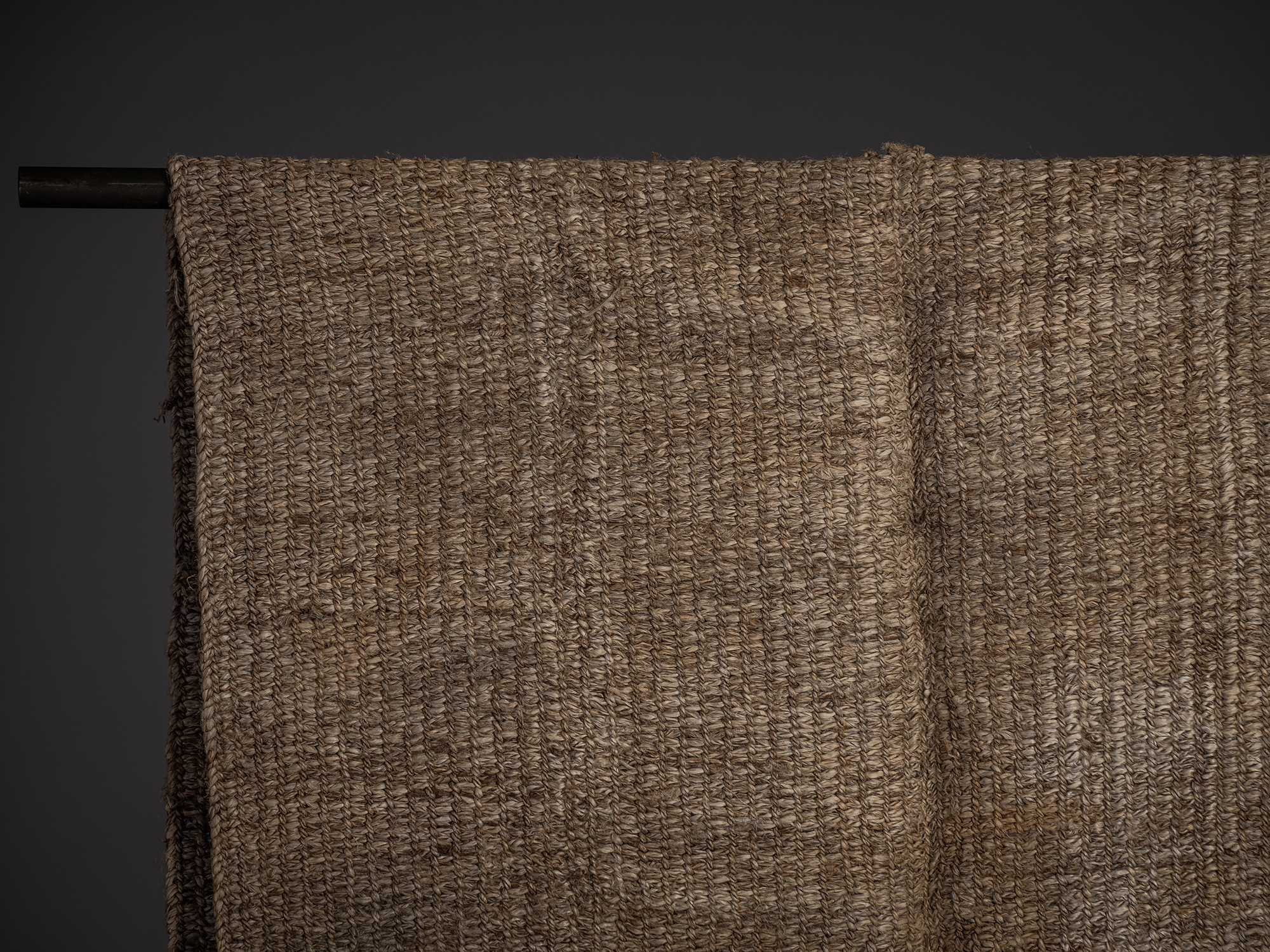 Detailed view of the shoulder and upper body of the angin sodenashi. The tightly woven fibers create...