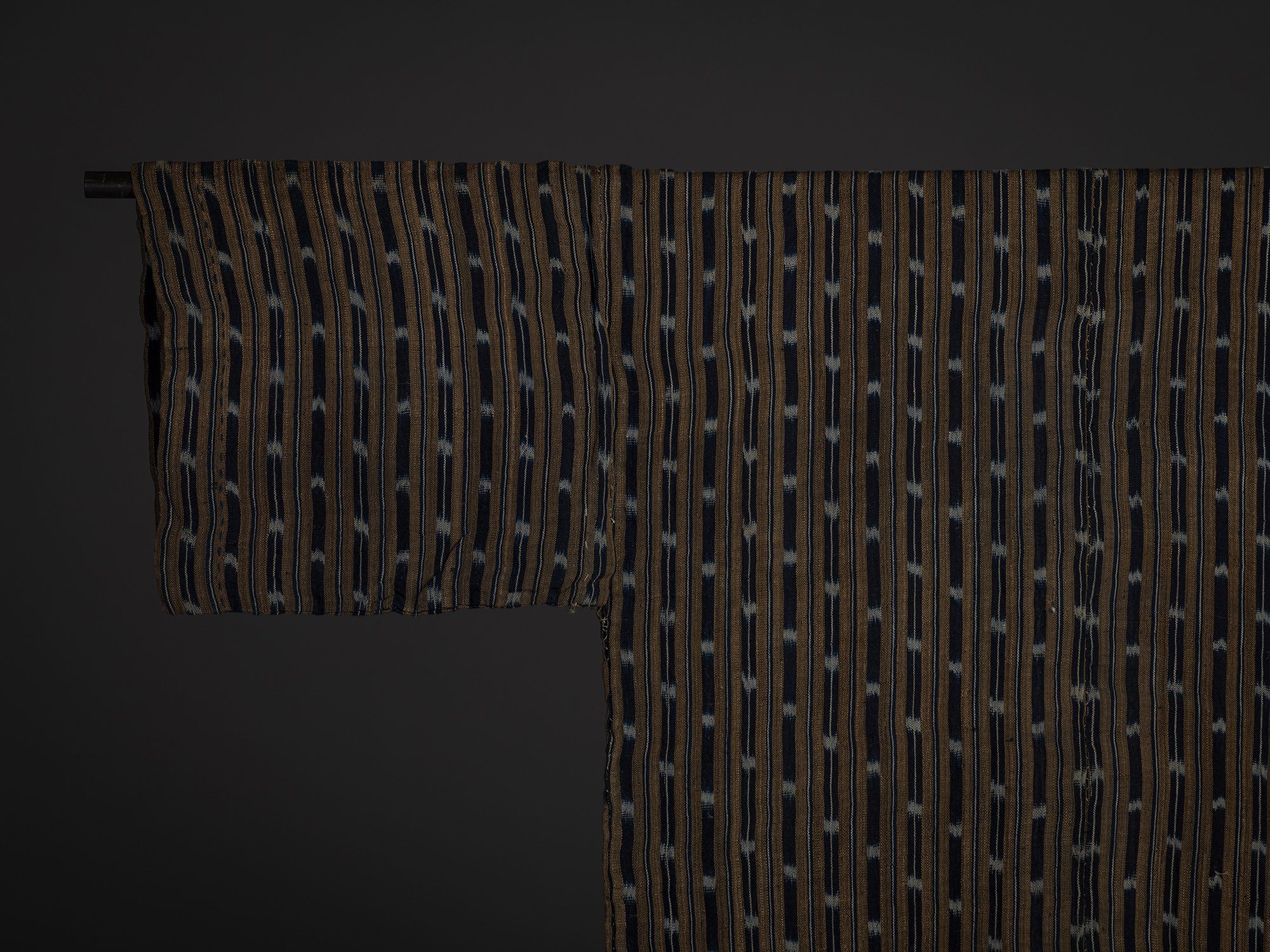 Close-up of the upper back of an Okinawan bashōfu kimono made of banana fiber and cotton. The image...