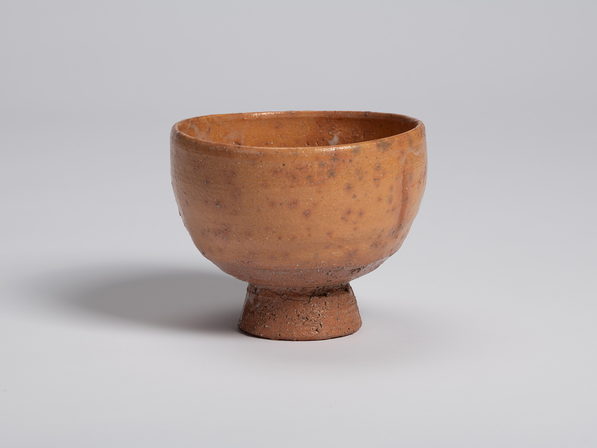 View of Goki Chawan by Shiro Tsujimura. The tea bowl has a rounded form with gently curving walls...