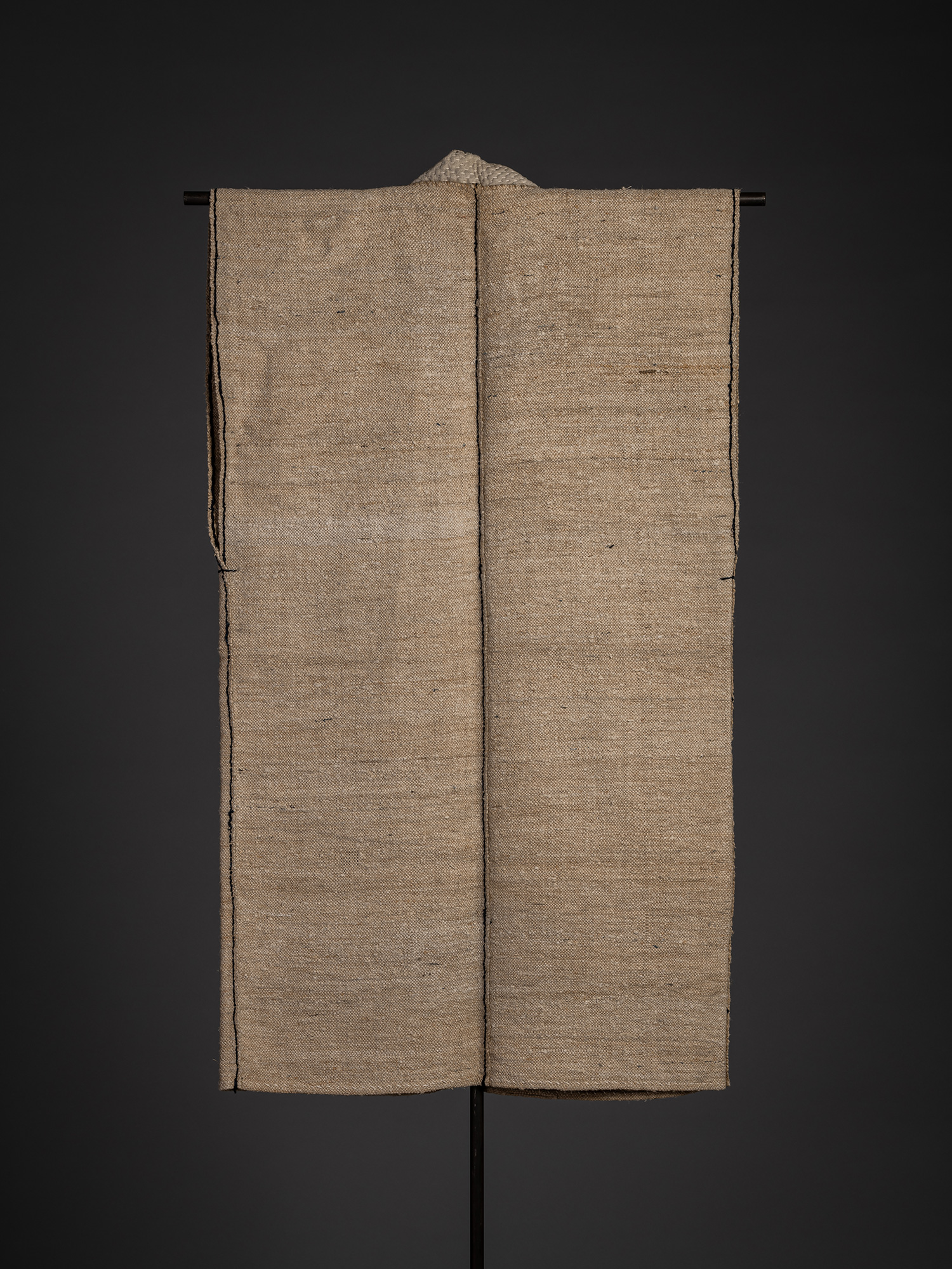 Back of the okusozakkuri sleeveless work garment. The back is formed from broad rectangular panels...