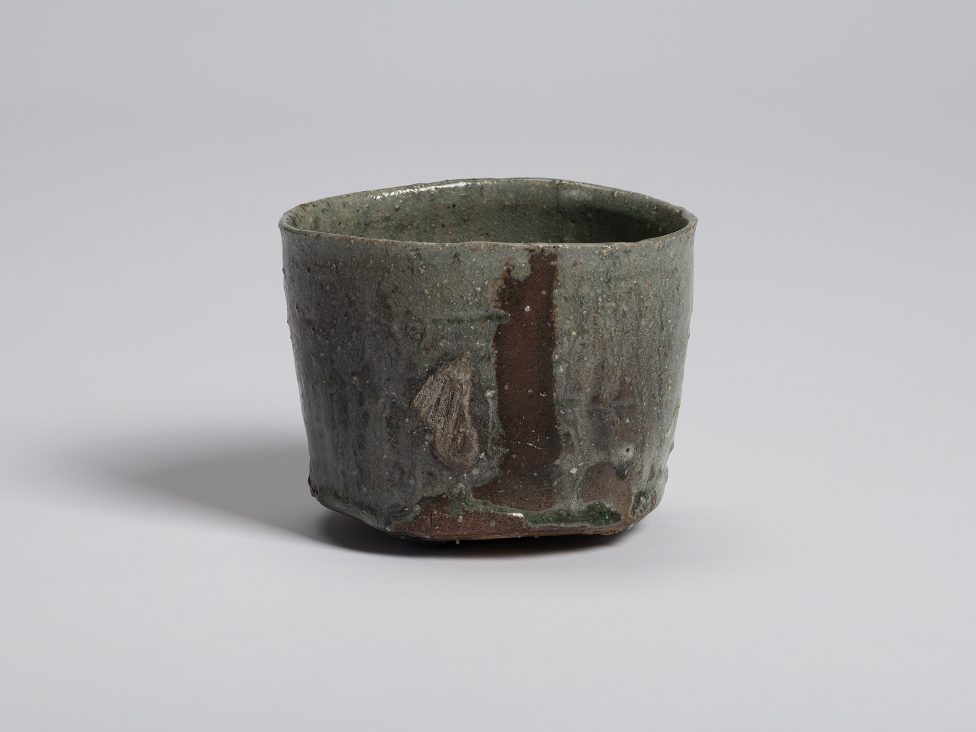 Rear view of Shigaraki Tsu Tsu Chawan featuring a vertical band of exposed reddish-brown clay bordered...