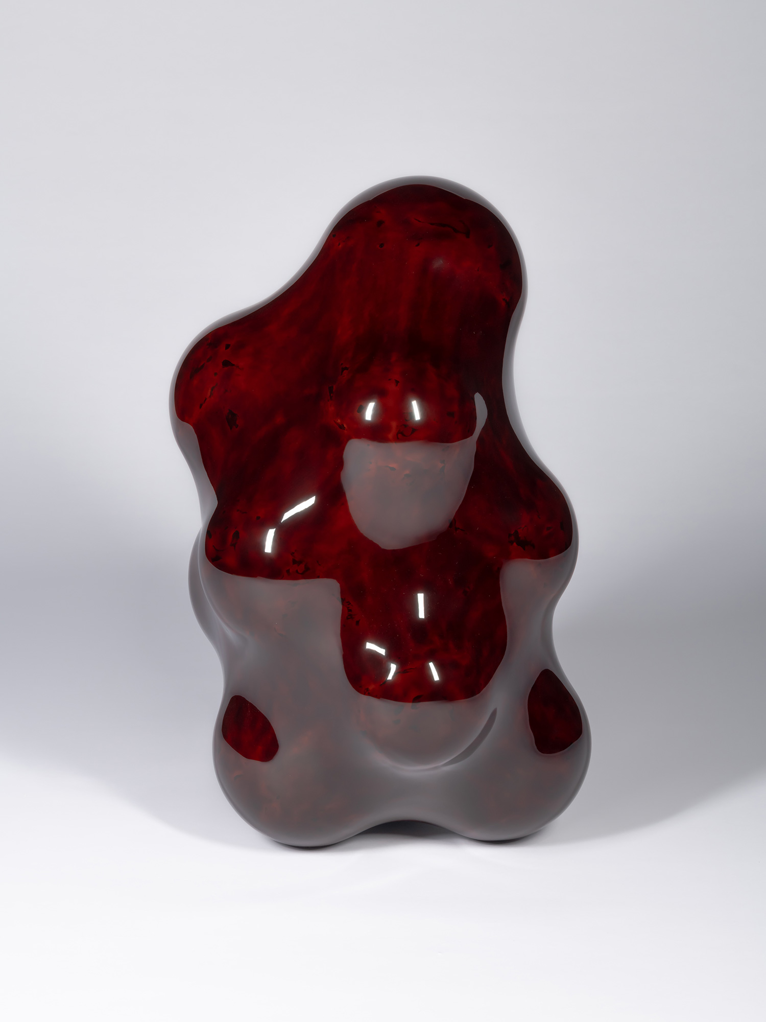 Front view of Surface Tactility #17. The organic form rises from a cluster of rounded lobes, with...