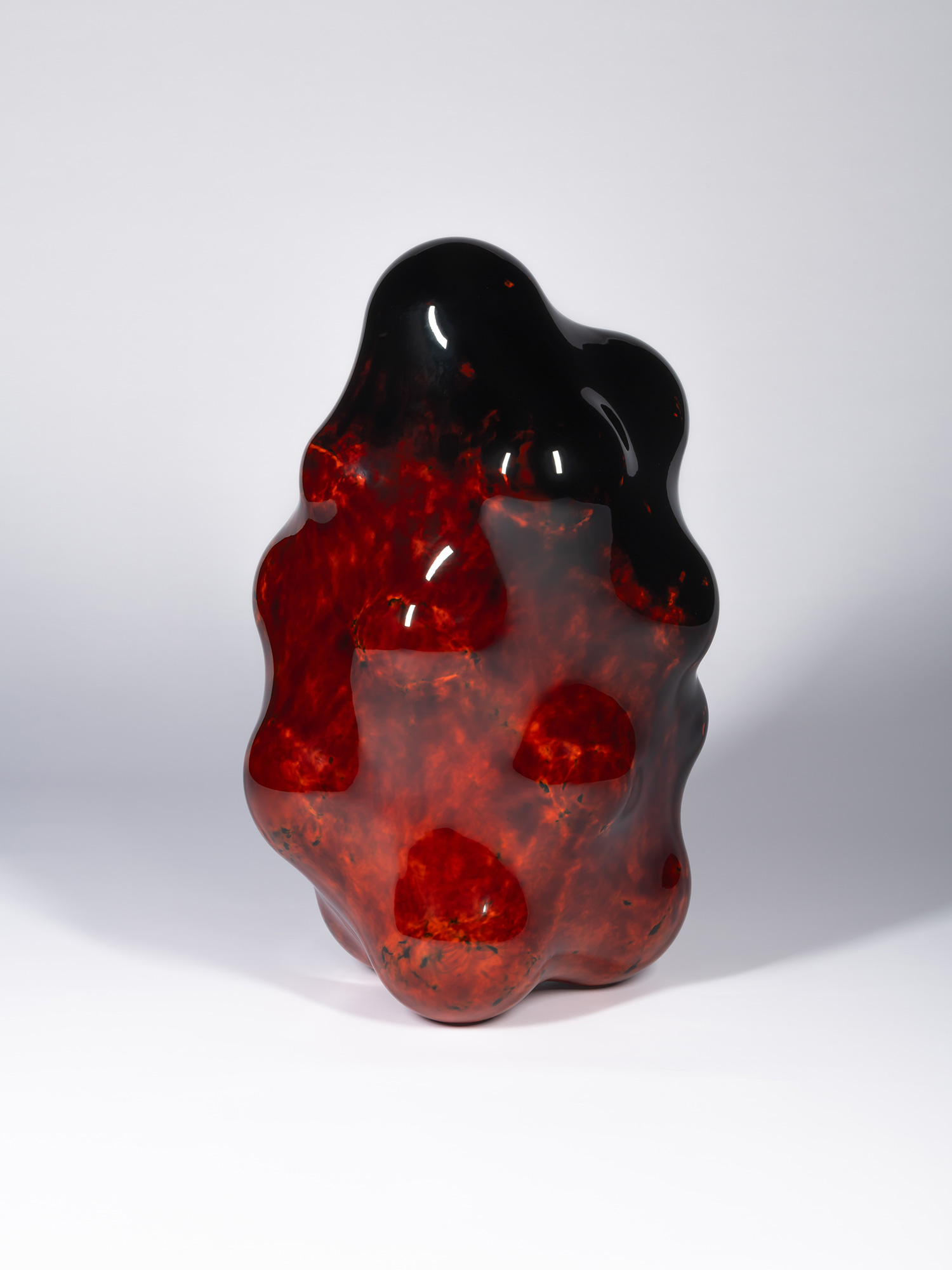 View of Surface Tactility #32 showing a cluster of rounded lobes and smooth depressions. The sculpture's...