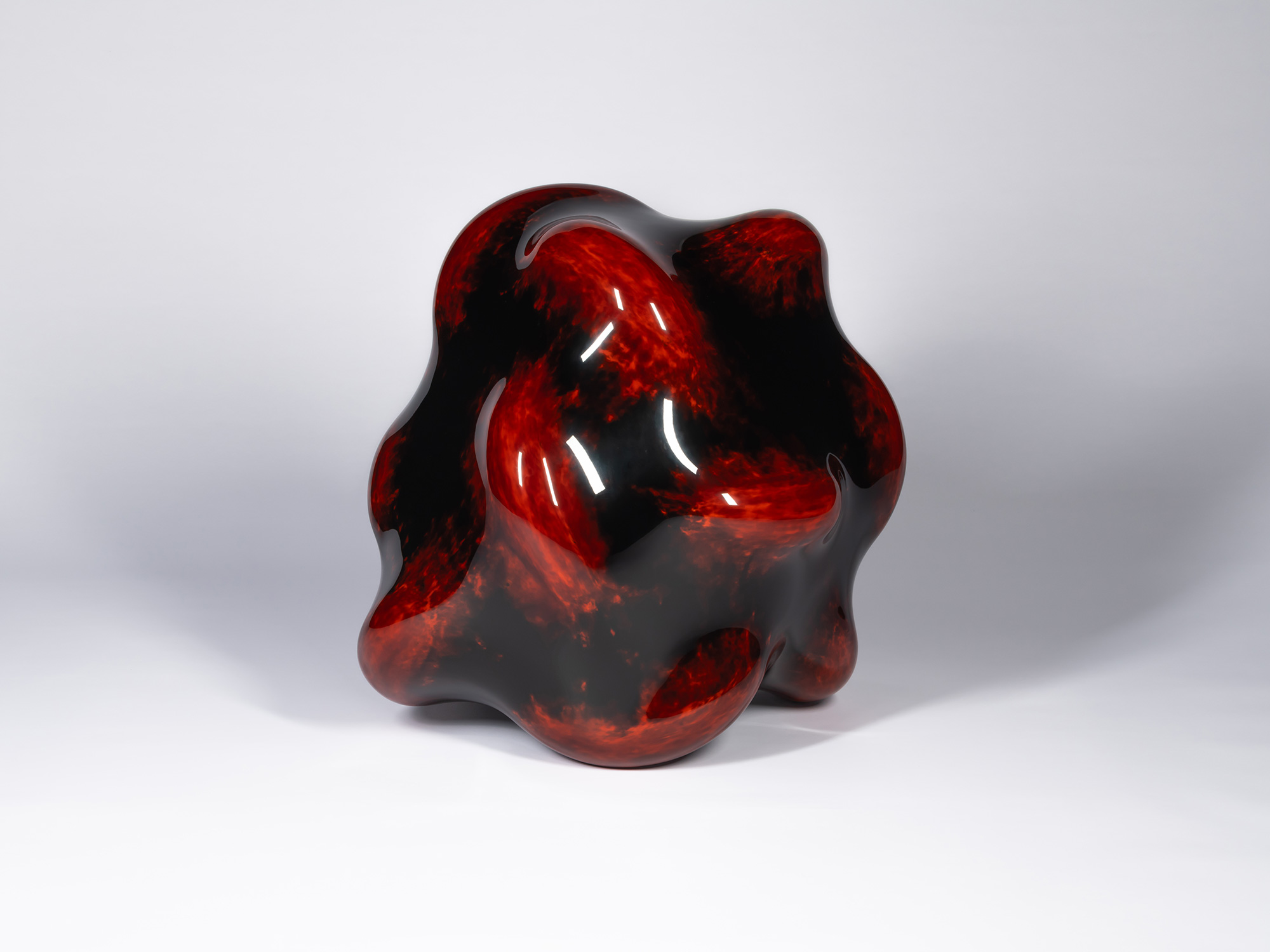 Taxis Groove – Bump by Ishizuka. The biomorphic sculpture features rounded, swelling forms and...