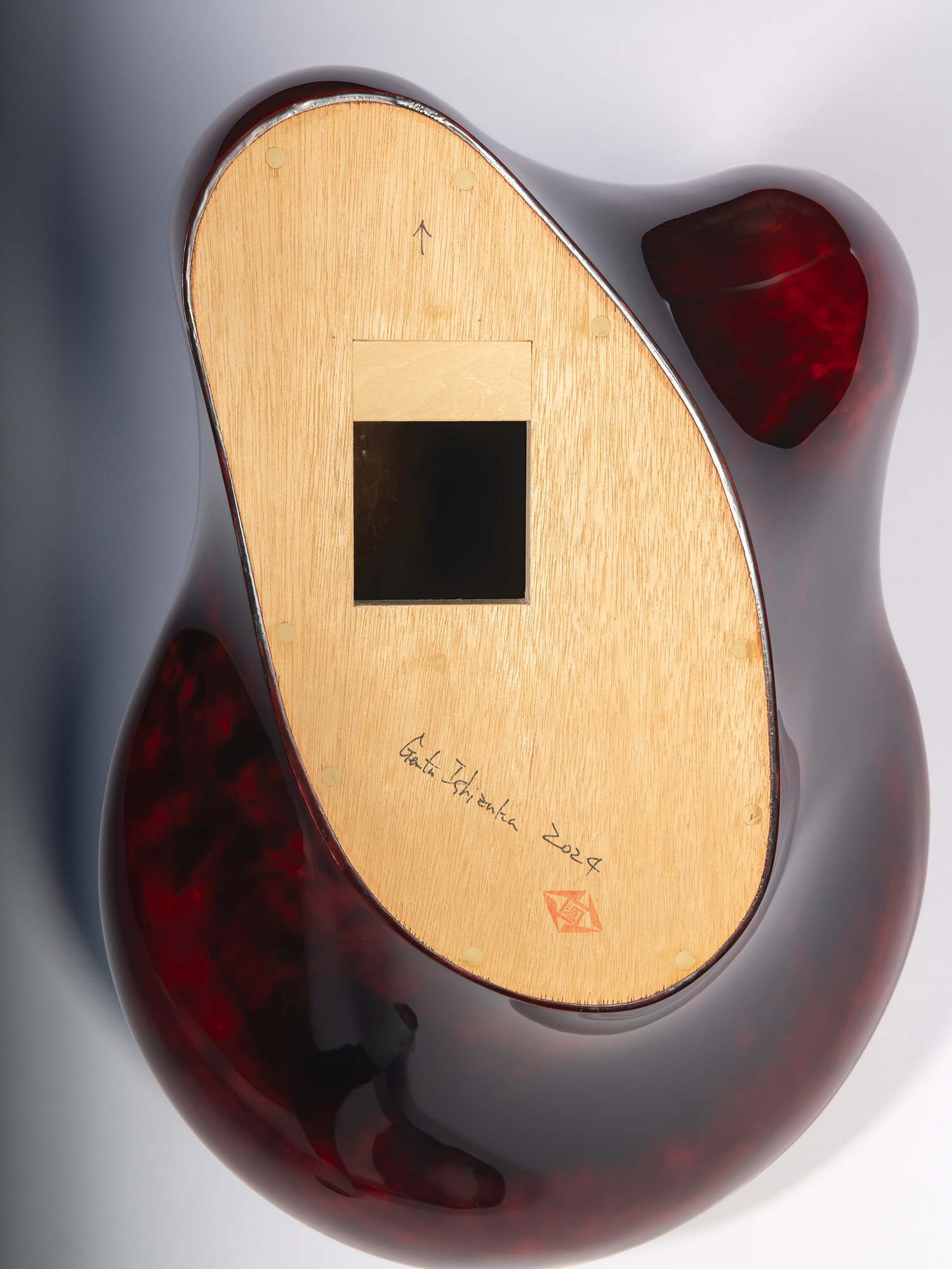 Back view of Taxis Groove (on wall) #4. A light wood mounting panel is inset into the back of the...