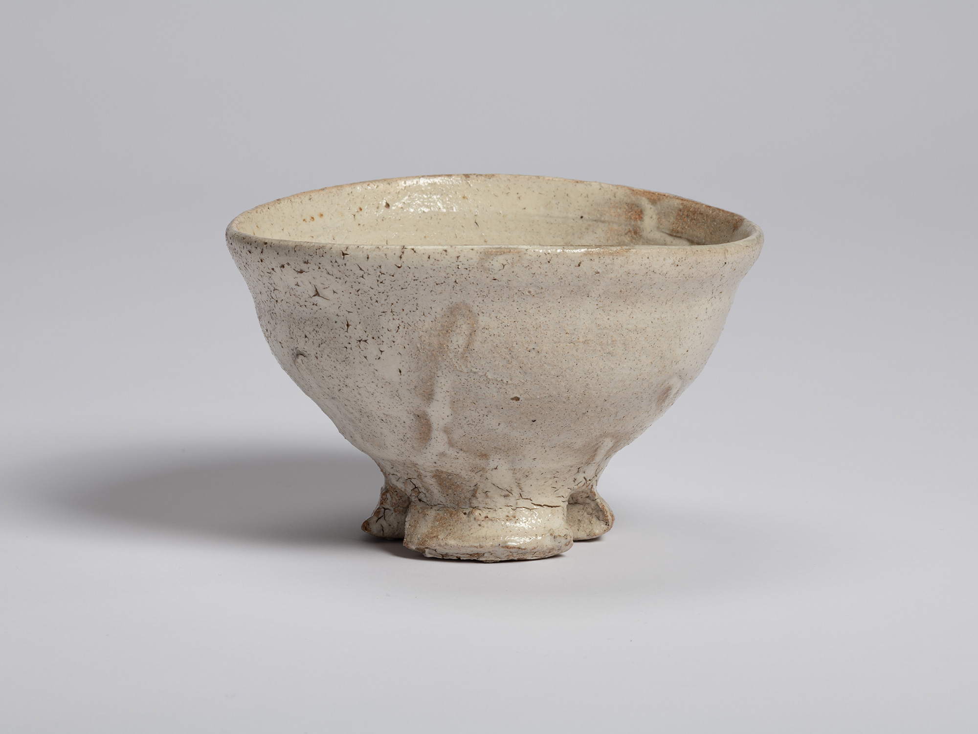 Side view of Tea Bowl (Tripodal Foot) by Shiro Tsujimura showing its broad, open profile and asymmetrical...