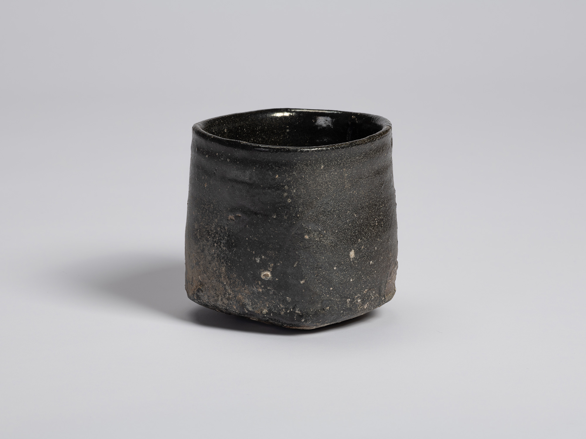 Hikidashi-style tea bowl by Shiro Tsujimura. The cylindrical bowl features softly rounded corners,...