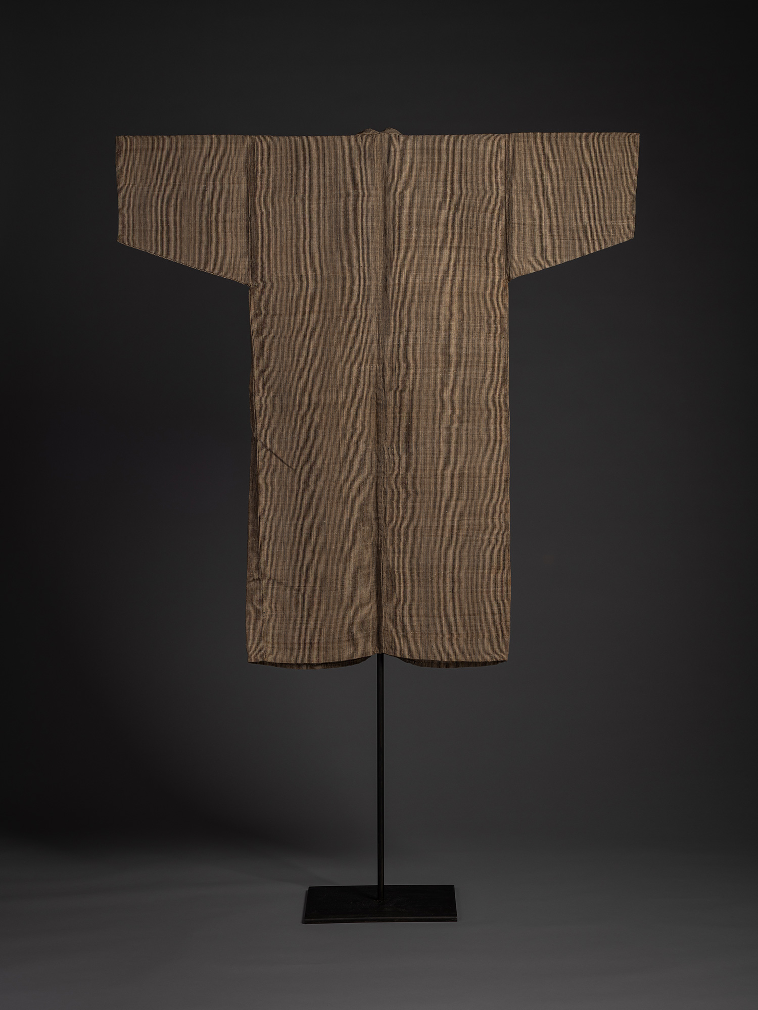 Full back view of the Tsushima katabira kimono displayed on a stand. The garment has a straight...