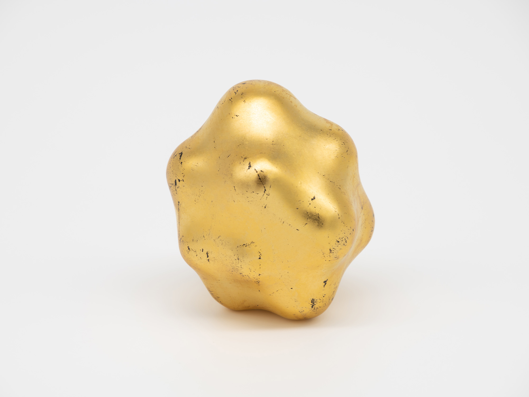 View of Untitled. The sculptureās irregular silhouette is defined by a series of smooth, mound-like...