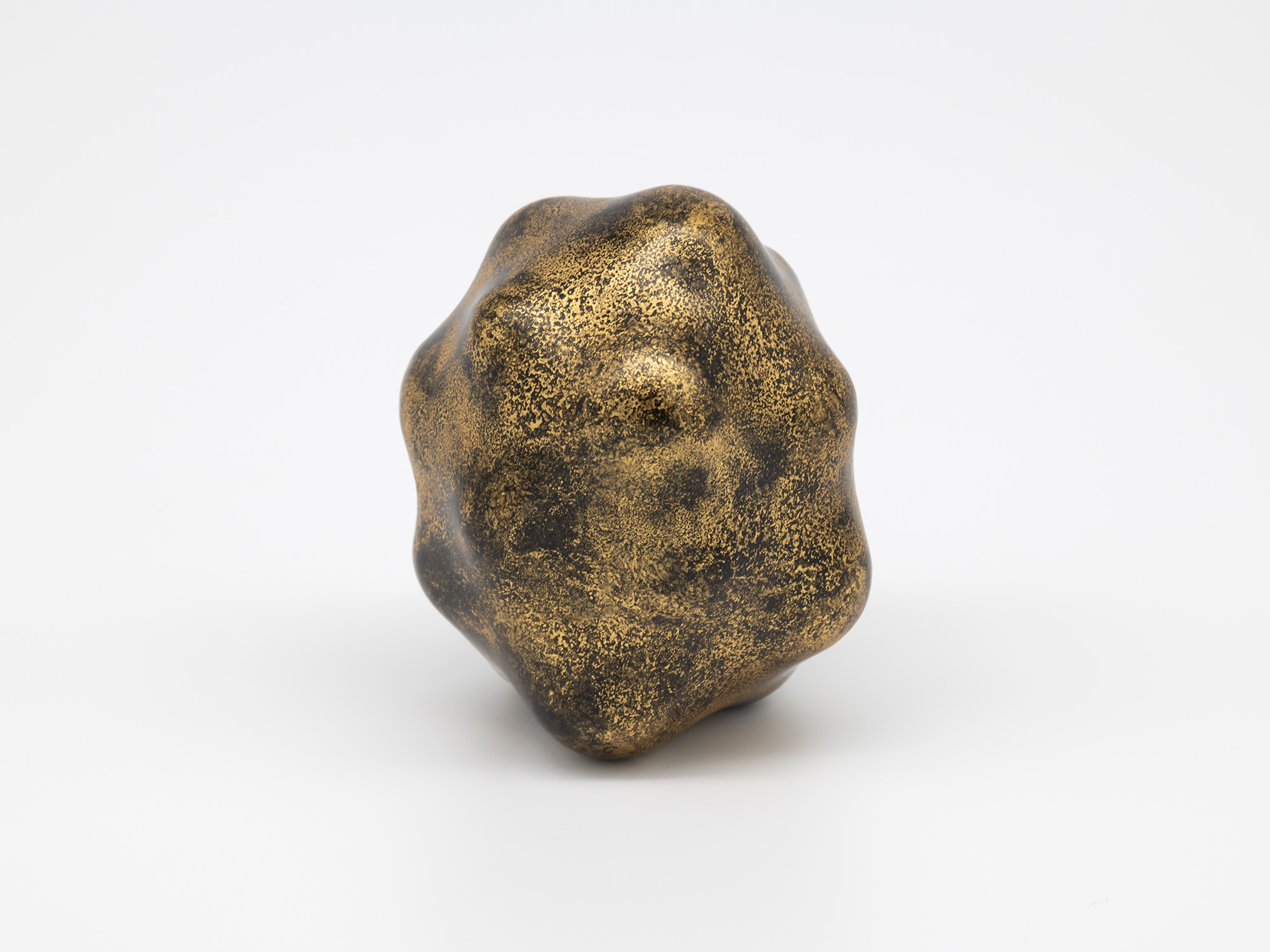 View of Untitled by Genta Ishizuka. The sculpture presents a different arrangement of rounded protrusions...