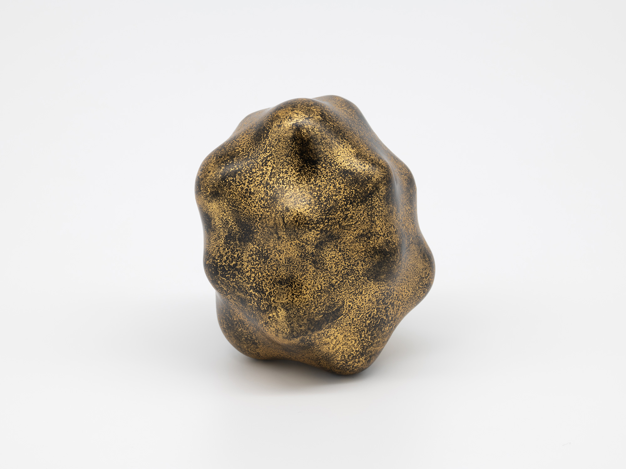 Untitled by Genta Ishizuka. Small abstract sculptural form with an irregular rounded shape and...