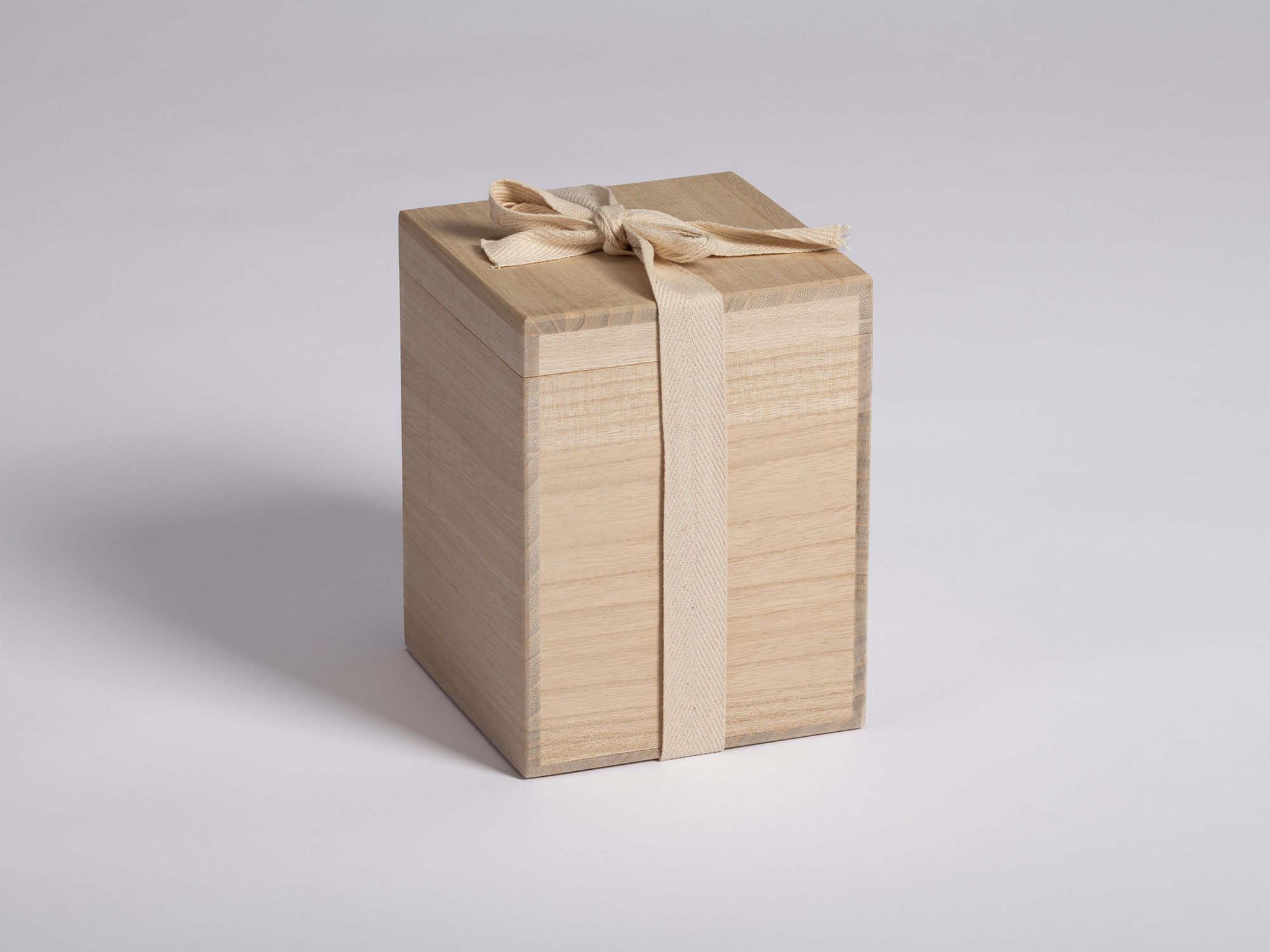 Closed paulownia wood presentation box (tomobako) for Absence – Holes by Genta Ishizuka. The rectangular...