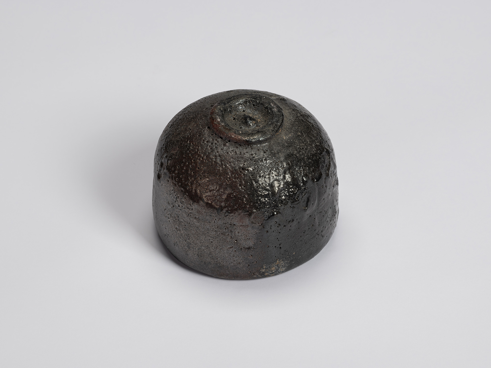 Bottom view of Chawan No. 13 revealing its rounded base and neatly trimmed circular foot ring....