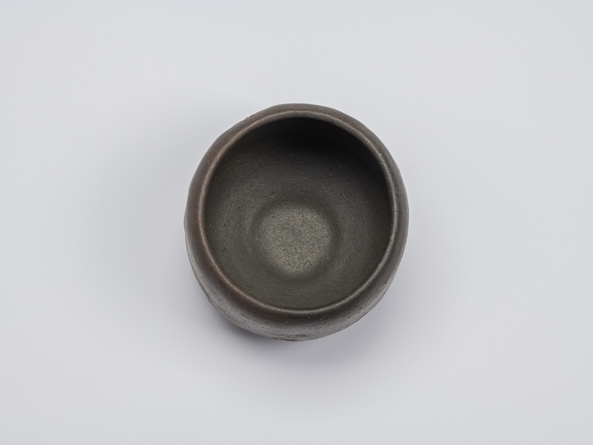 Overhead view of Chawan No. 14 showing its nearly circular mouth, softly rounded rim, and deep...