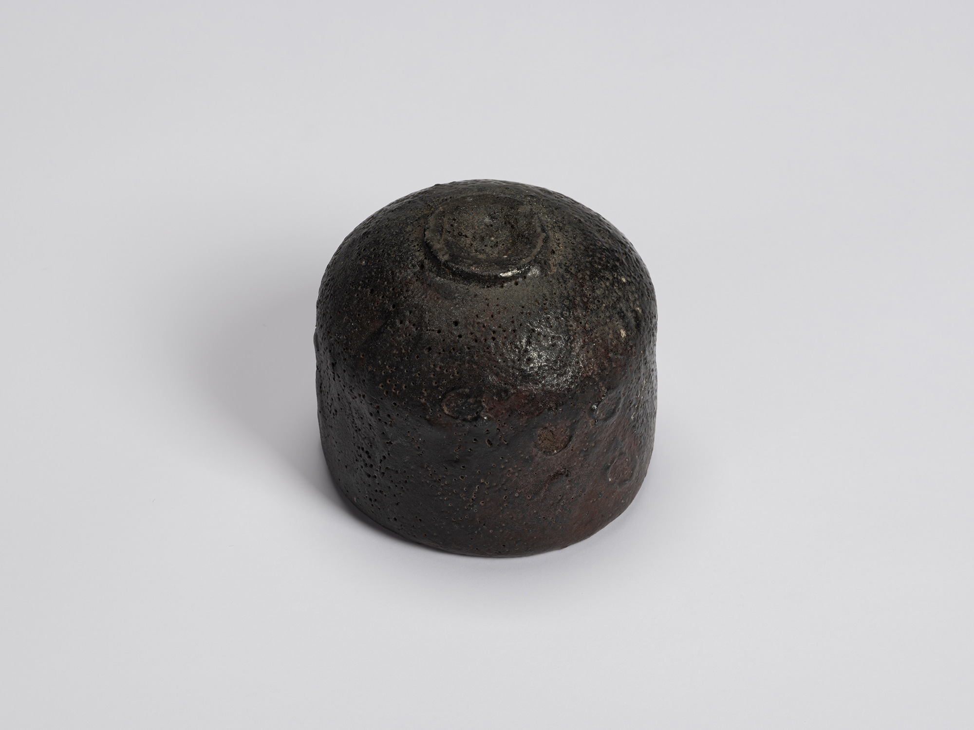 Bottom view of Chawan No. 17 showing its rounded underside and neatly trimmed circular foot ring....