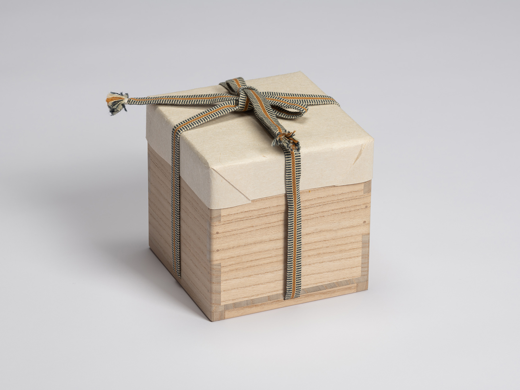 Kiribako (paulownia wood storage box) for Shiro Tsujimura's Chawan, wrapped in protective paper...