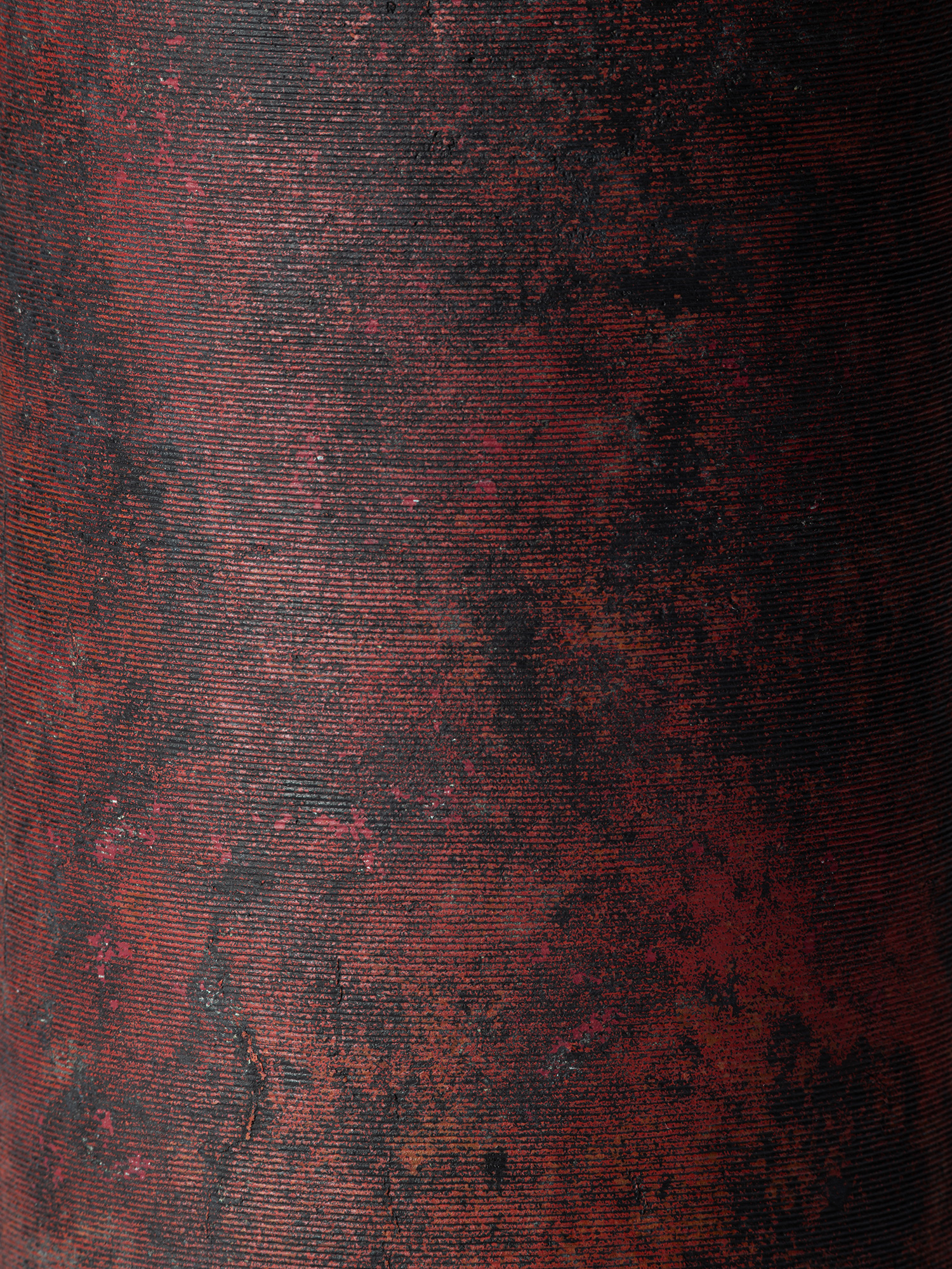 Close-up detail of Cylinder with Lid – Red by Koji Hatakeyama showing the finely incised horizontal...