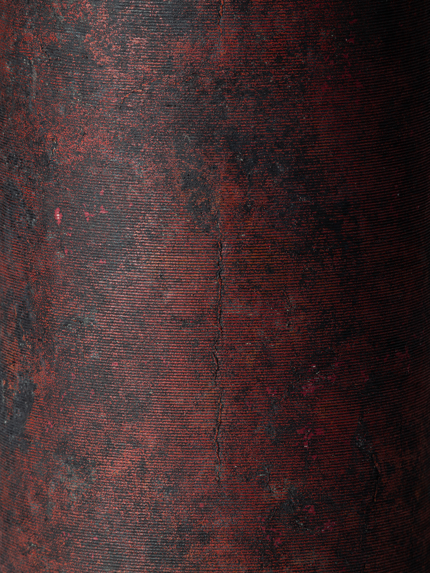 Close-up detail of Cylinder with Lid – Red by Koji Hatakeyama showing the finely incised horizontal...