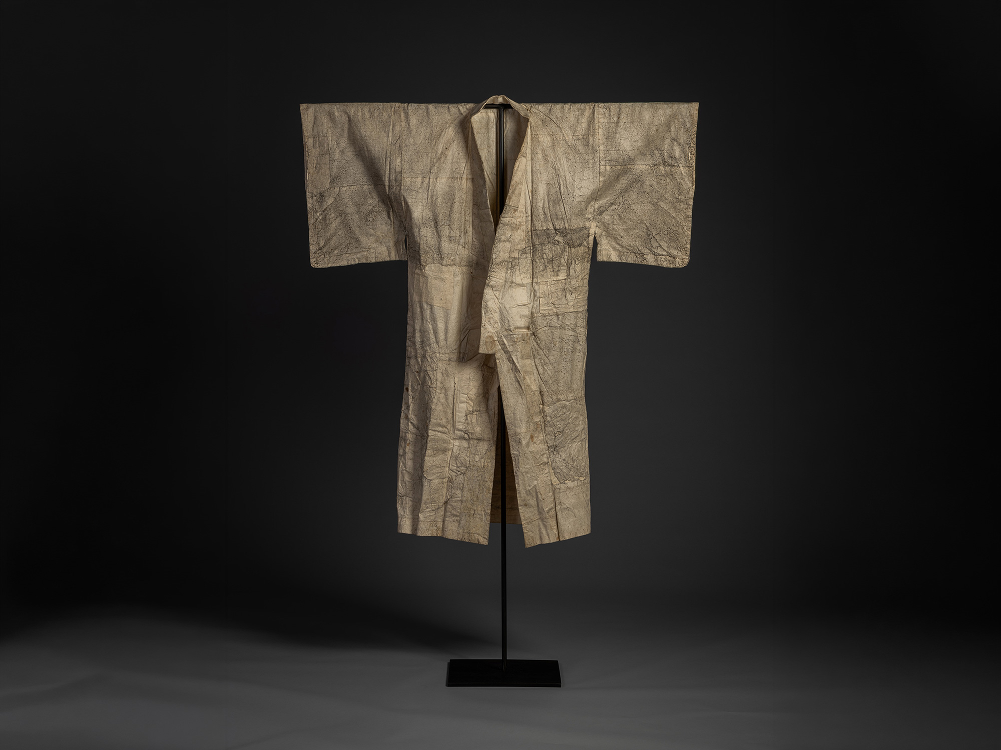 Early 20th-century Japanese kamiko kimono made of layered washi paper, undyed and naturally toned,...
