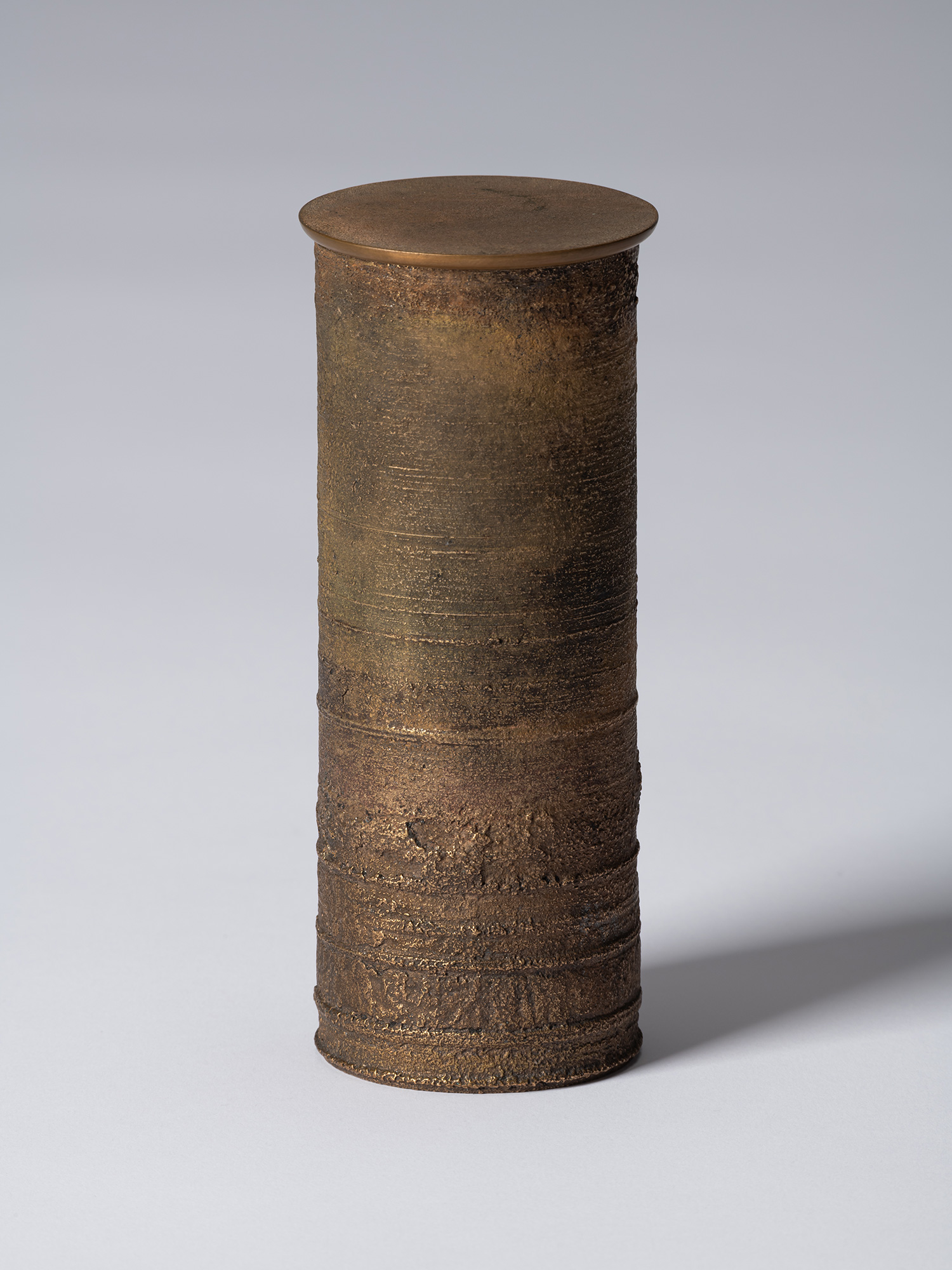 ronze as Bronze II No. 18 by Koji Hatakeyama, a tall cylindrical bronze vessel with a fitted circular...
