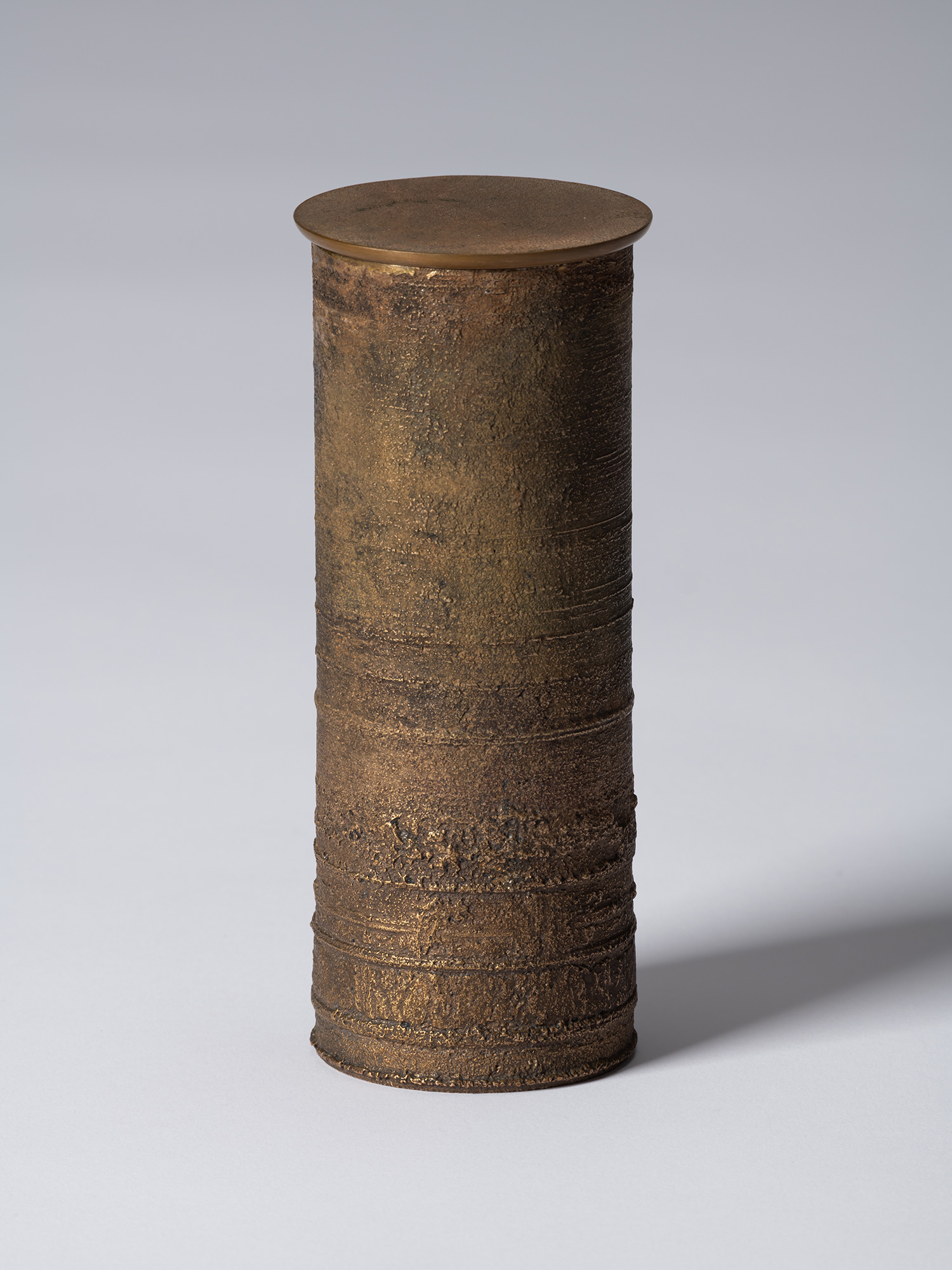 ronze as Bronze II No. 18 by Koji Hatakeyama, a tall cylindrical bronze vessel with a fitted circular...