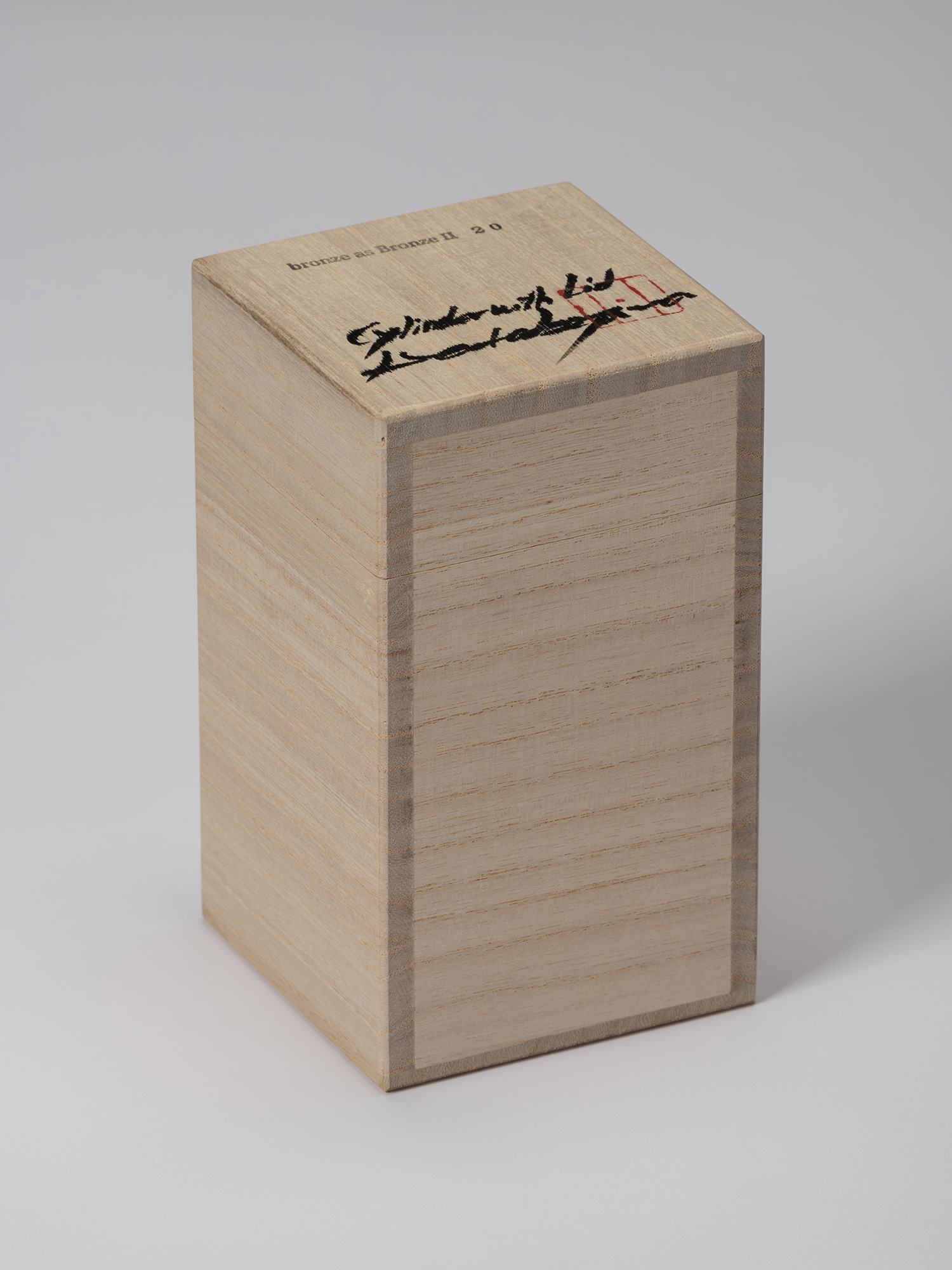 Closed wooden presentation box for Koji Hatakeyama’s bronze as Bronze II No. 20, with the title...