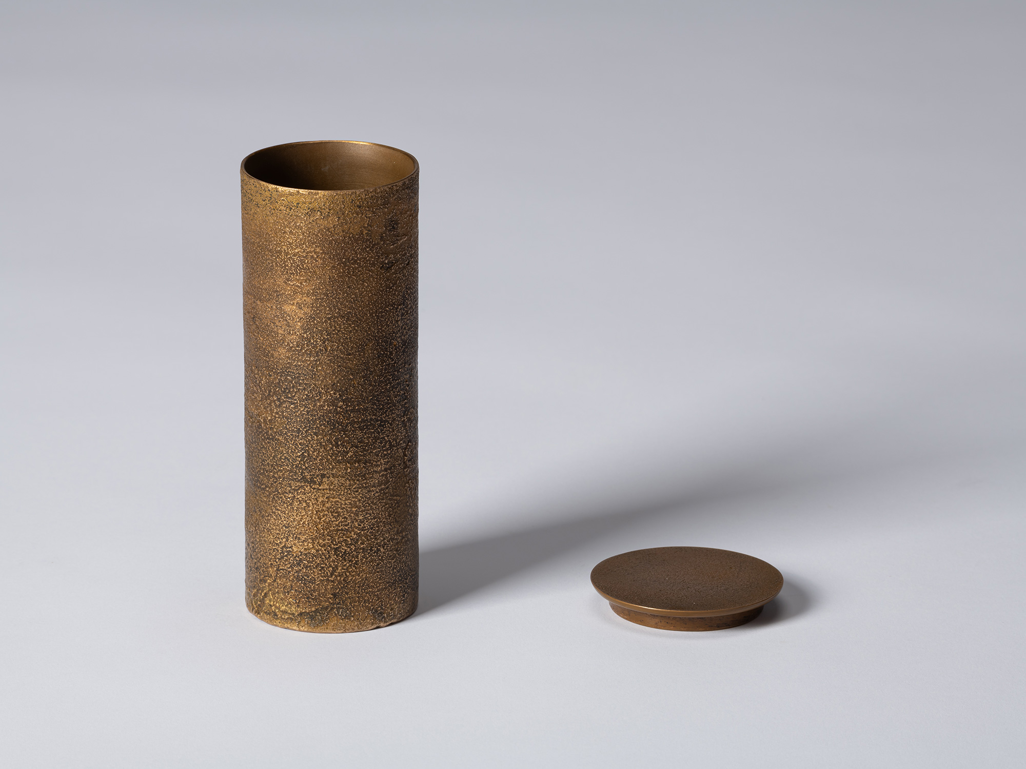 bronze as Bronze II No. 21 by Koji Hatakeyama shown with its lid removed, revealing the bronze...