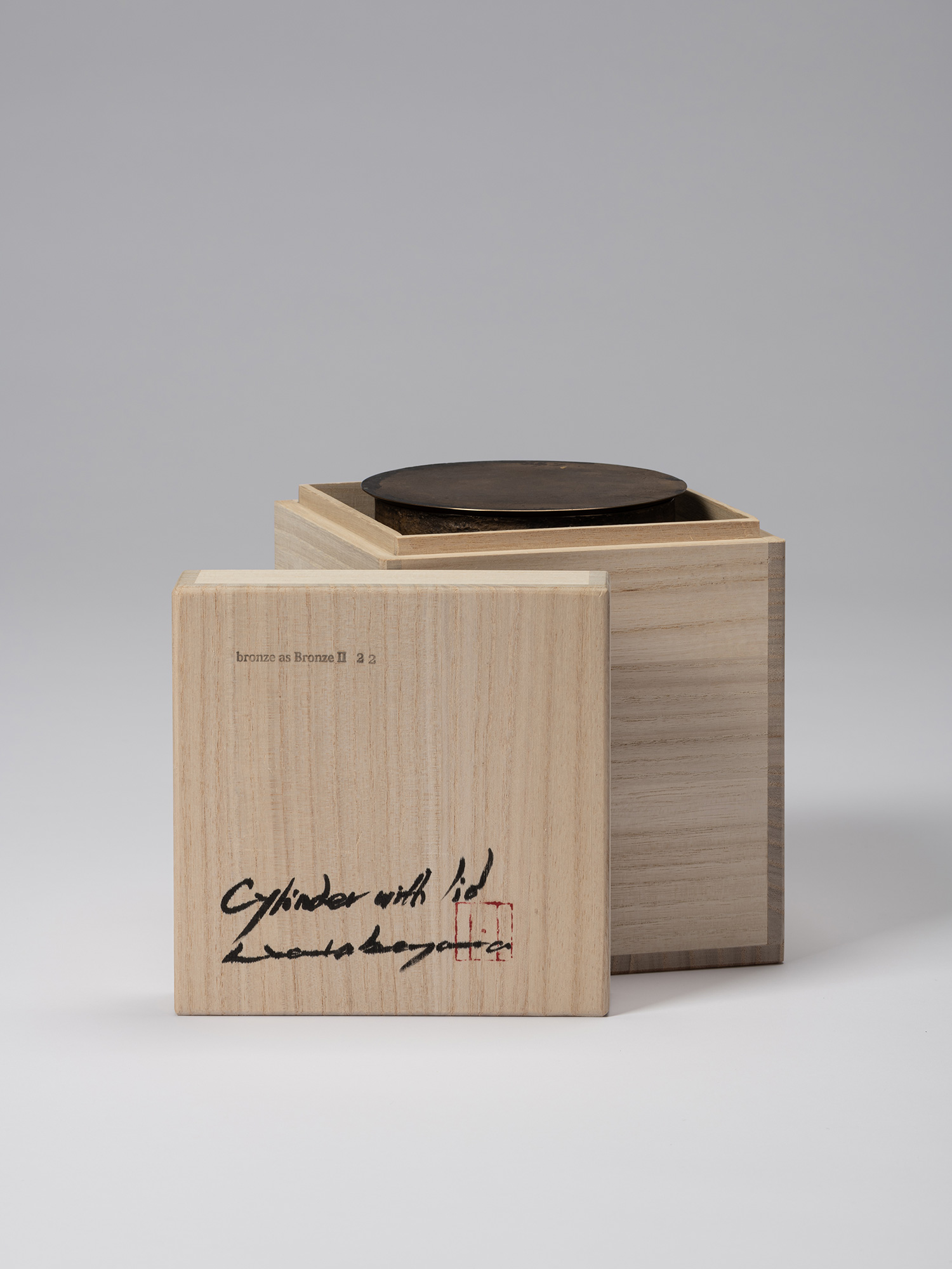 Open wooden tomobako for Koji Hatakeyama’s bronze as Bronze II No. 22, with the inscribed lid resting...