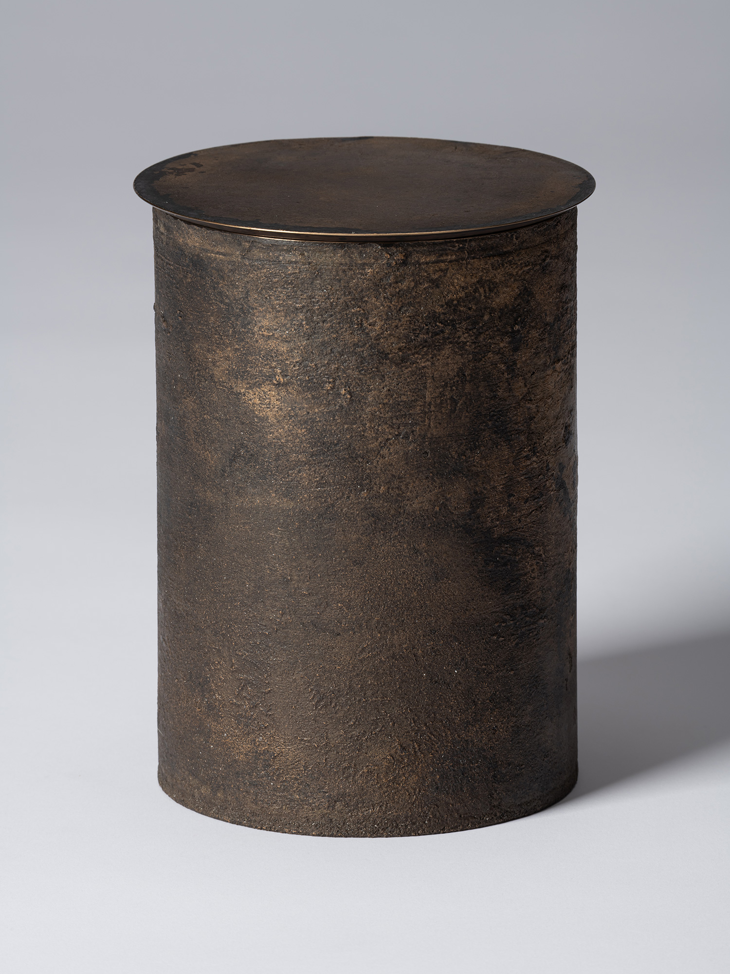 View of Koji Hatakeyama’s bronze as Bronze II No. 22, a cylindrical bronze vessel with a flat circular...