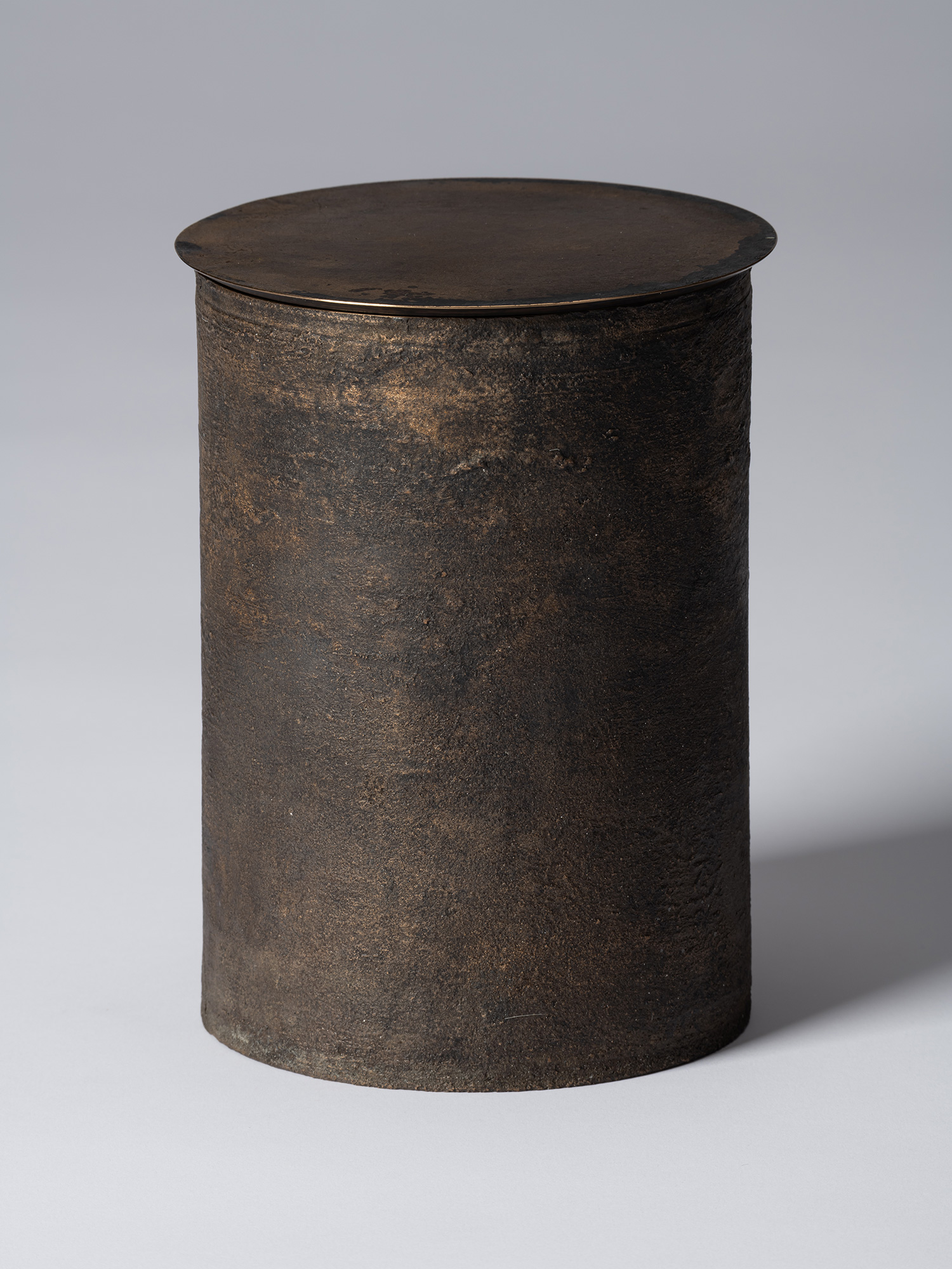 View of Koji Hatakeyama’s bronze as Bronze II No. 22, a cylindrical bronze vessel with a flat circular...