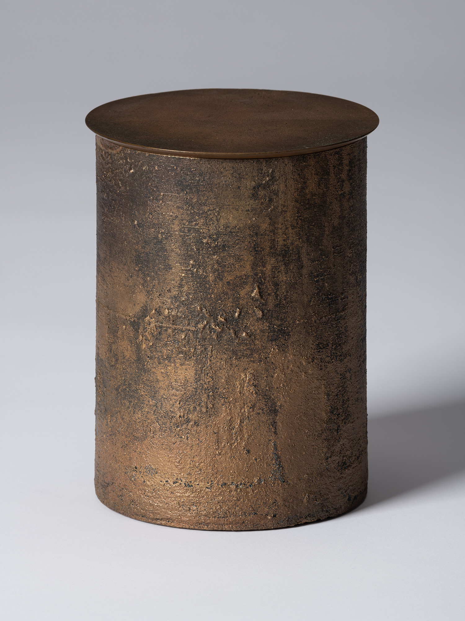 View of Koji Hatakeyama’s bronze as Bronze II No. 23, a cylindrical bronze vessel with a flat circular...
