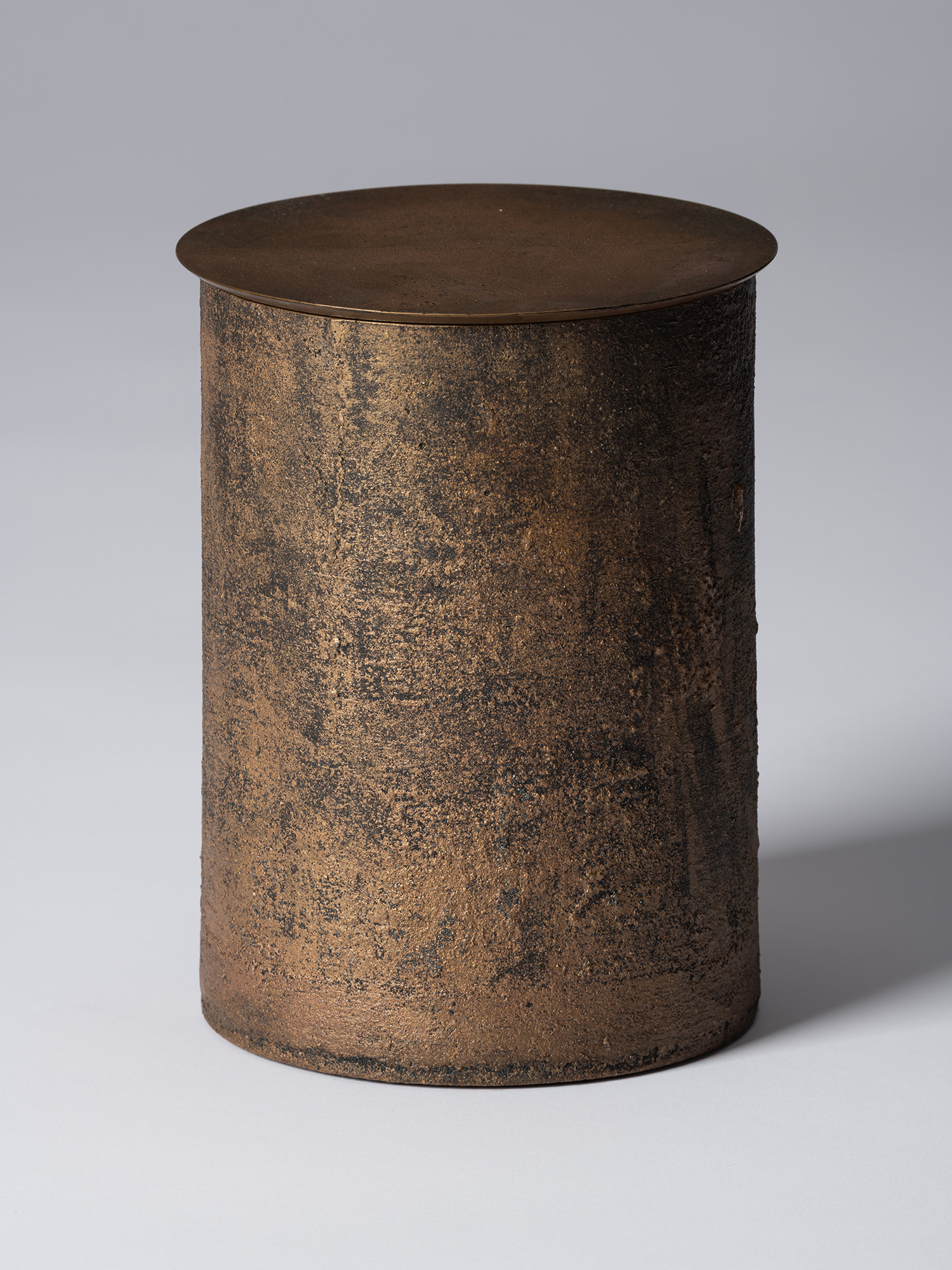 View of Koji Hatakeyama’s bronze as Bronze II No. 23, a cylindrical bronze vessel with a flat circular...