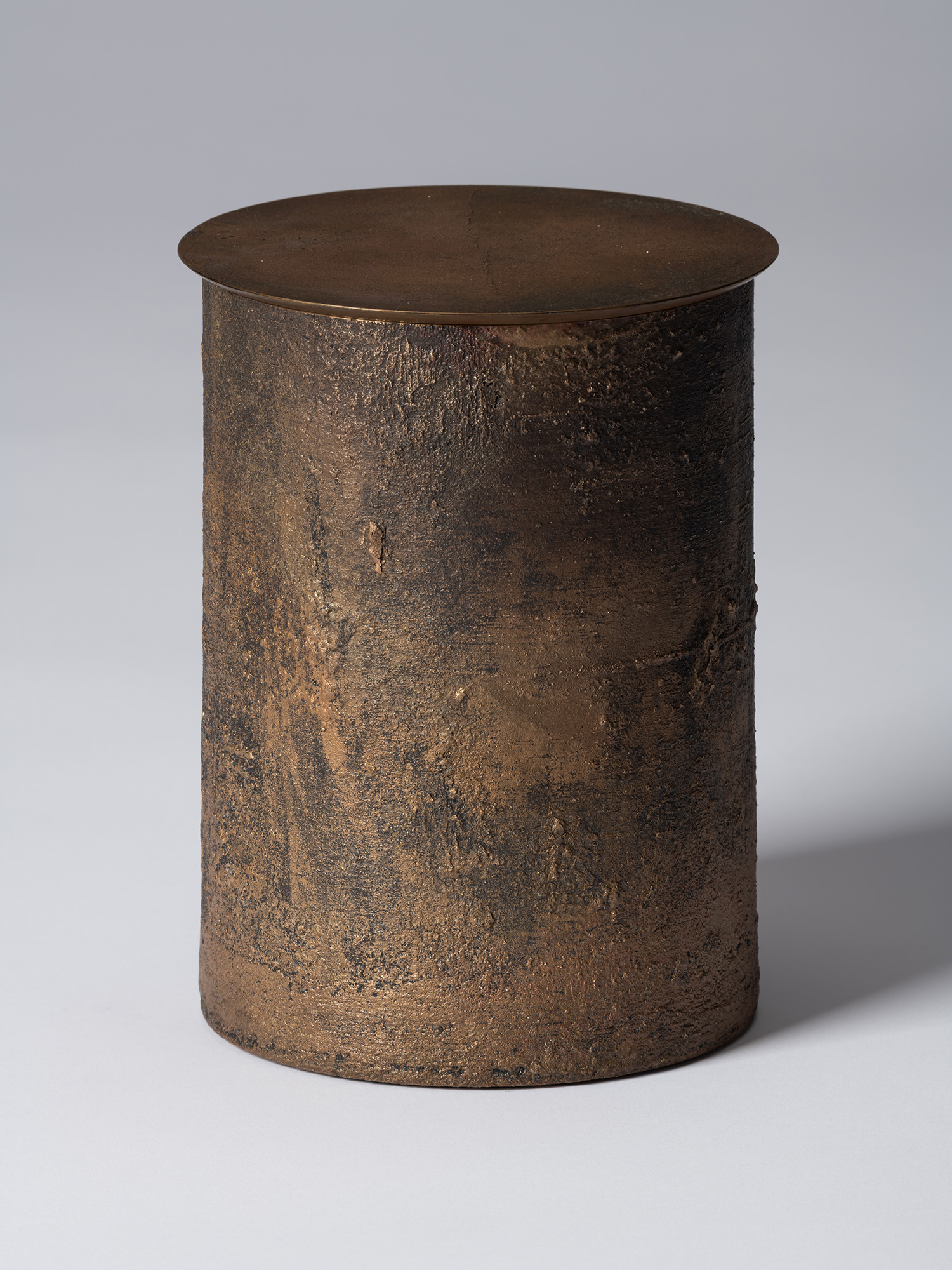 View of Koji Hatakeyama’s bronze as Bronze II No. 23, a cylindrical bronze vessel with a flat circular...