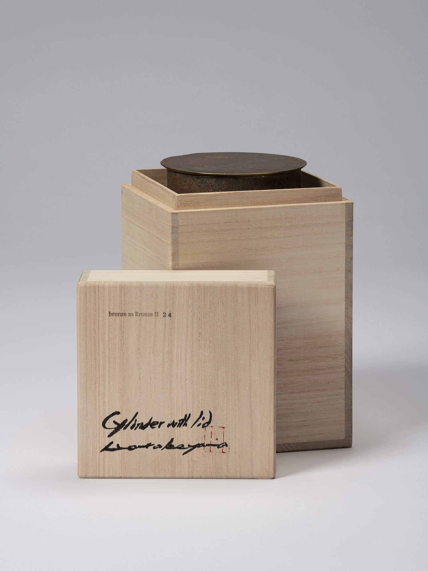 Open wooden tomobako for Koji Hatakeyama’s bronze as Bronze II No. 24, with the inscribed lid resting...