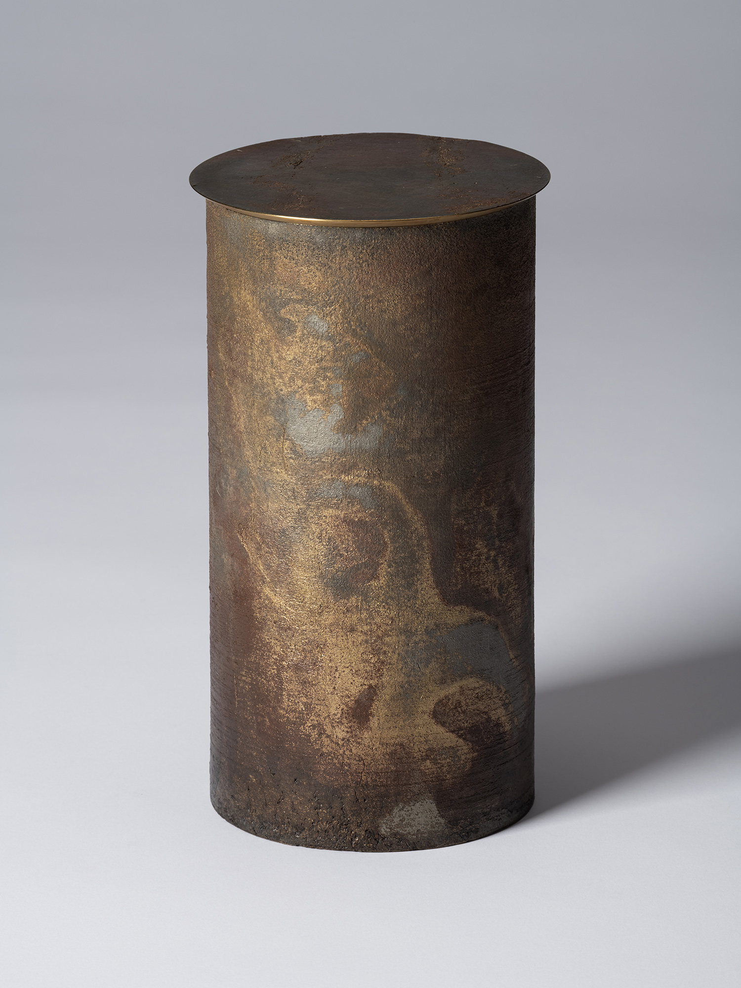 View of Koji Hatakeyama’s bronze as Bronze II No. 24, a tall cylindrical bronze vessel with a flat...
