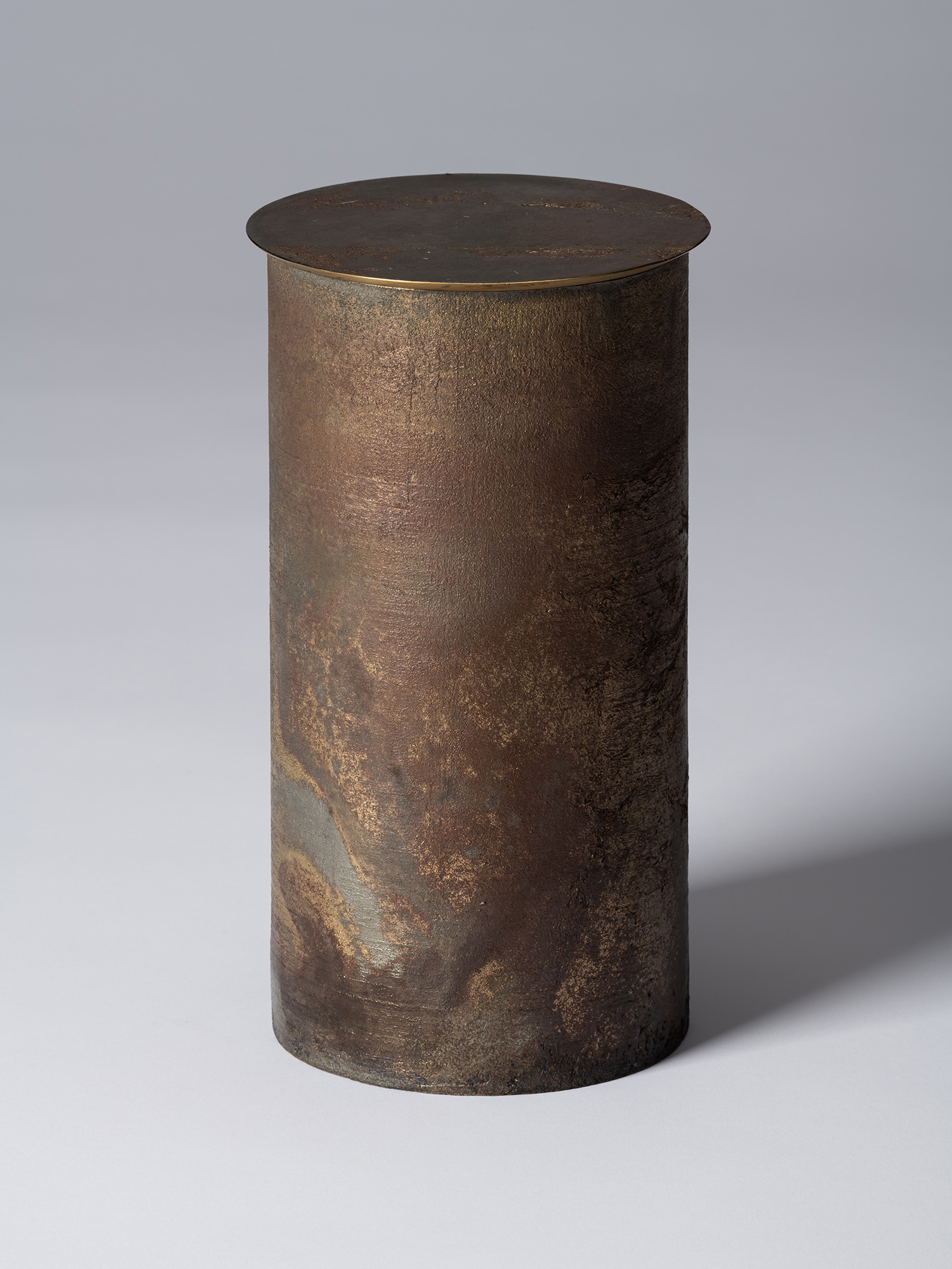 View of Koji Hatakeyama’s bronze as Bronze II No. 24, a tall cylindrical bronze vessel with a flat...
