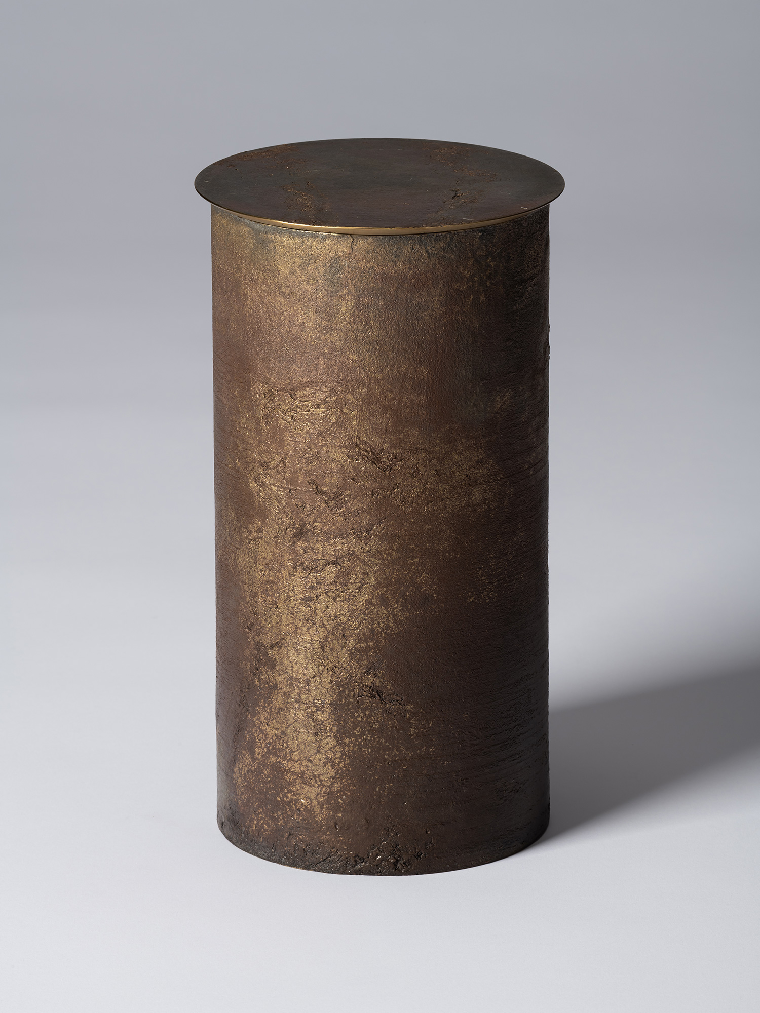View of Koji Hatakeyama’s bronze as Bronze II No. 24, a tall cylindrical bronze vessel with a flat...