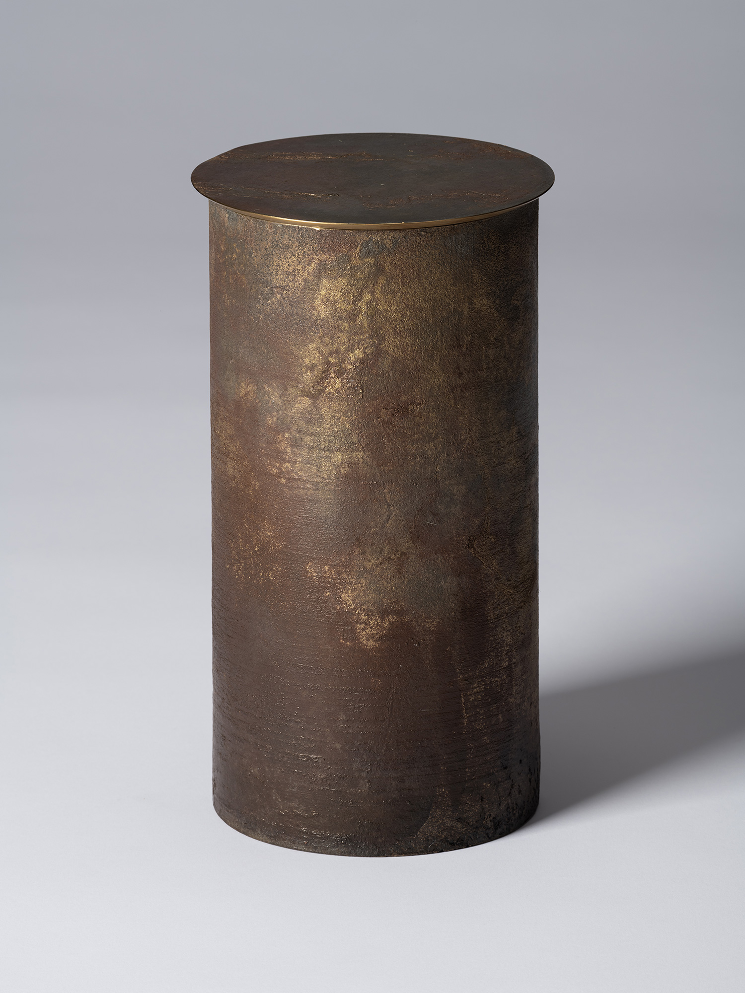 View of Koji Hatakeyama’s bronze as Bronze II No. 24, a tall cylindrical bronze vessel with a flat...