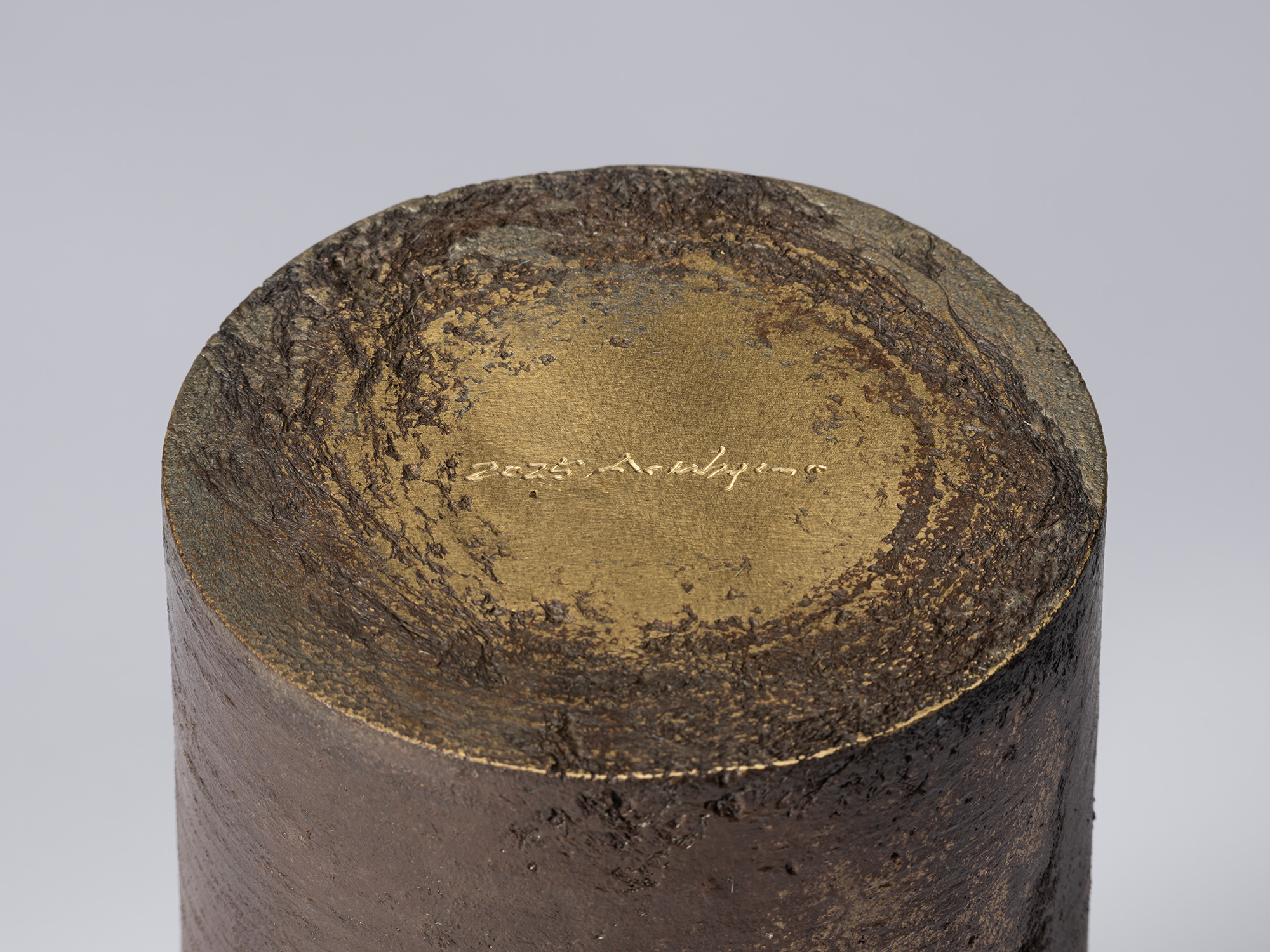 Detail of the underside of Koji Hatakeyama’s bronze as Bronze II No. 24, showing a smooth circular...