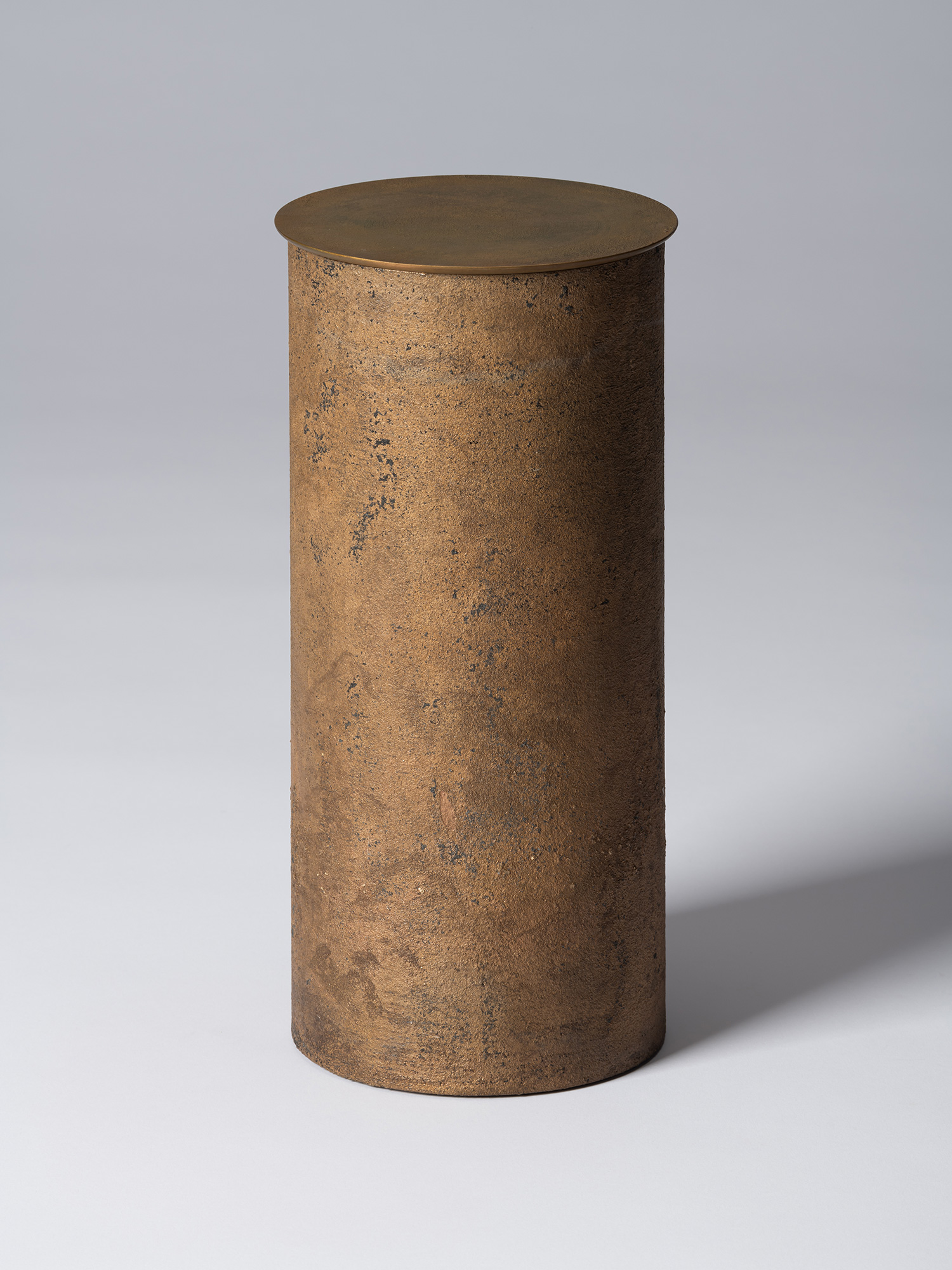 View of Koji Hatakeyama’s bronze as Bronze II No. 26, a tall cylindrical bronze vessel with a flat...