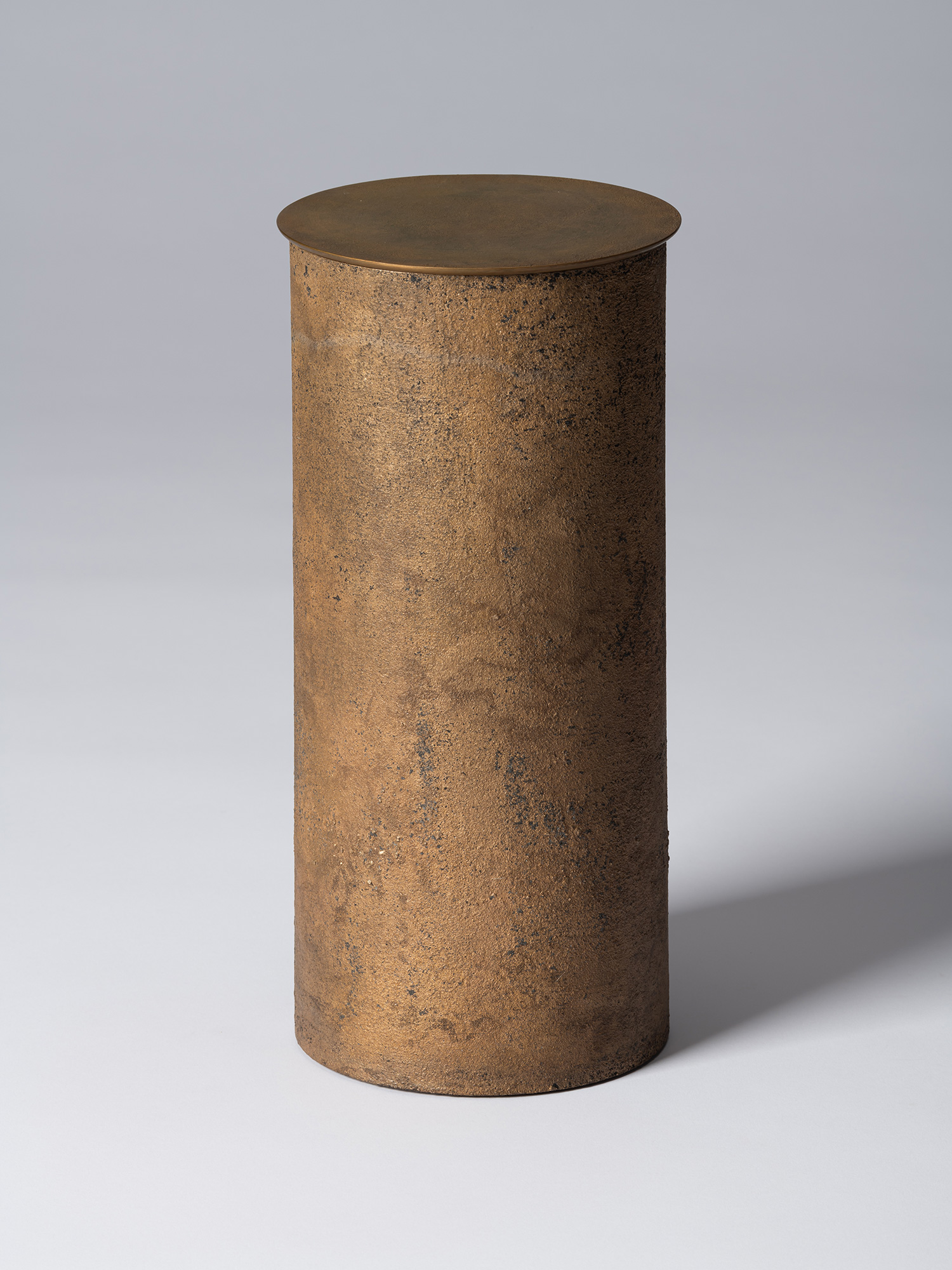 View of Koji Hatakeyama’s bronze as Bronze II No. 26, a tall cylindrical bronze vessel with a flat...