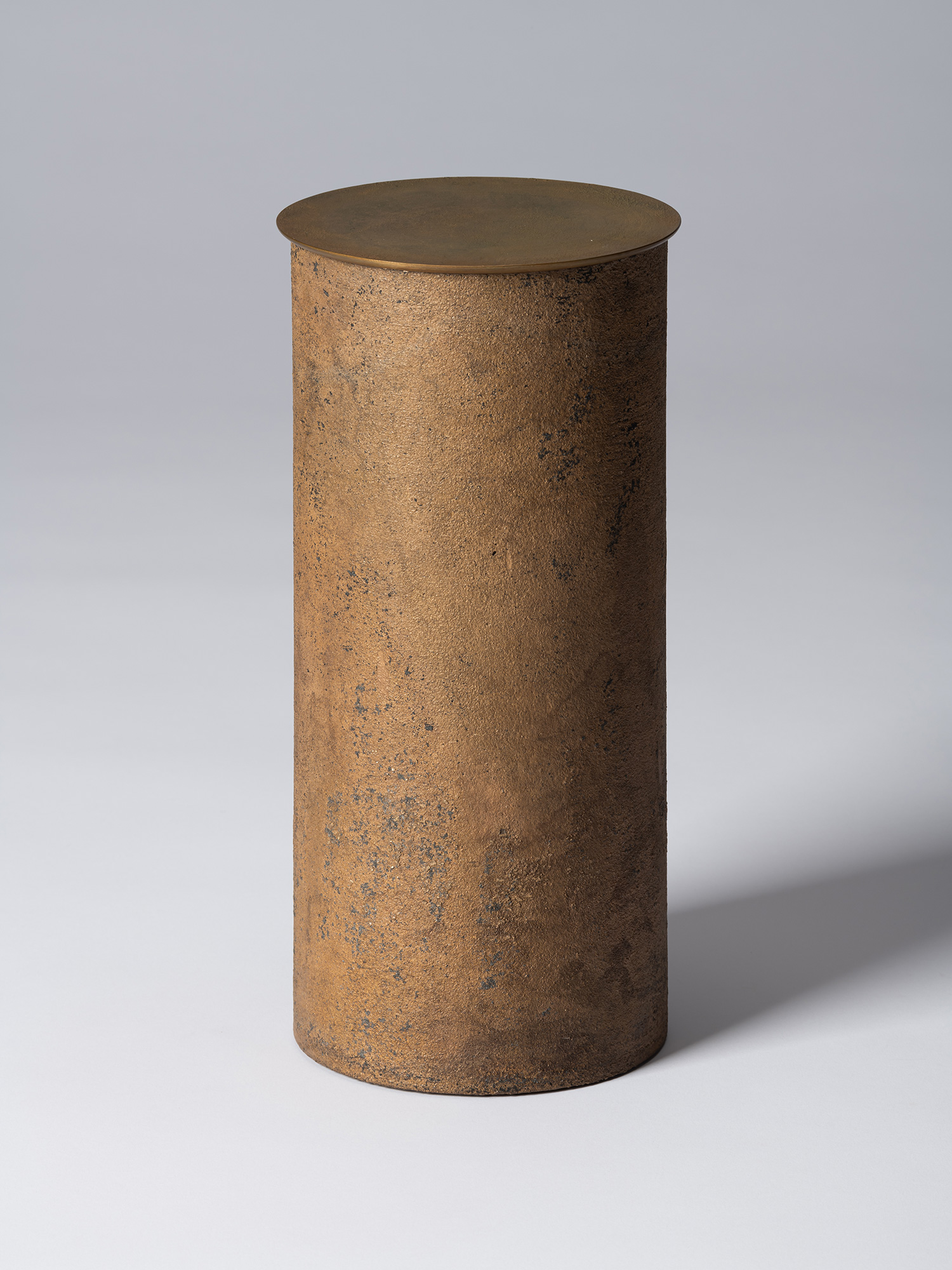 View of Koji Hatakeyama’s bronze as Bronze II No. 26, a tall cylindrical bronze vessel with a flat...