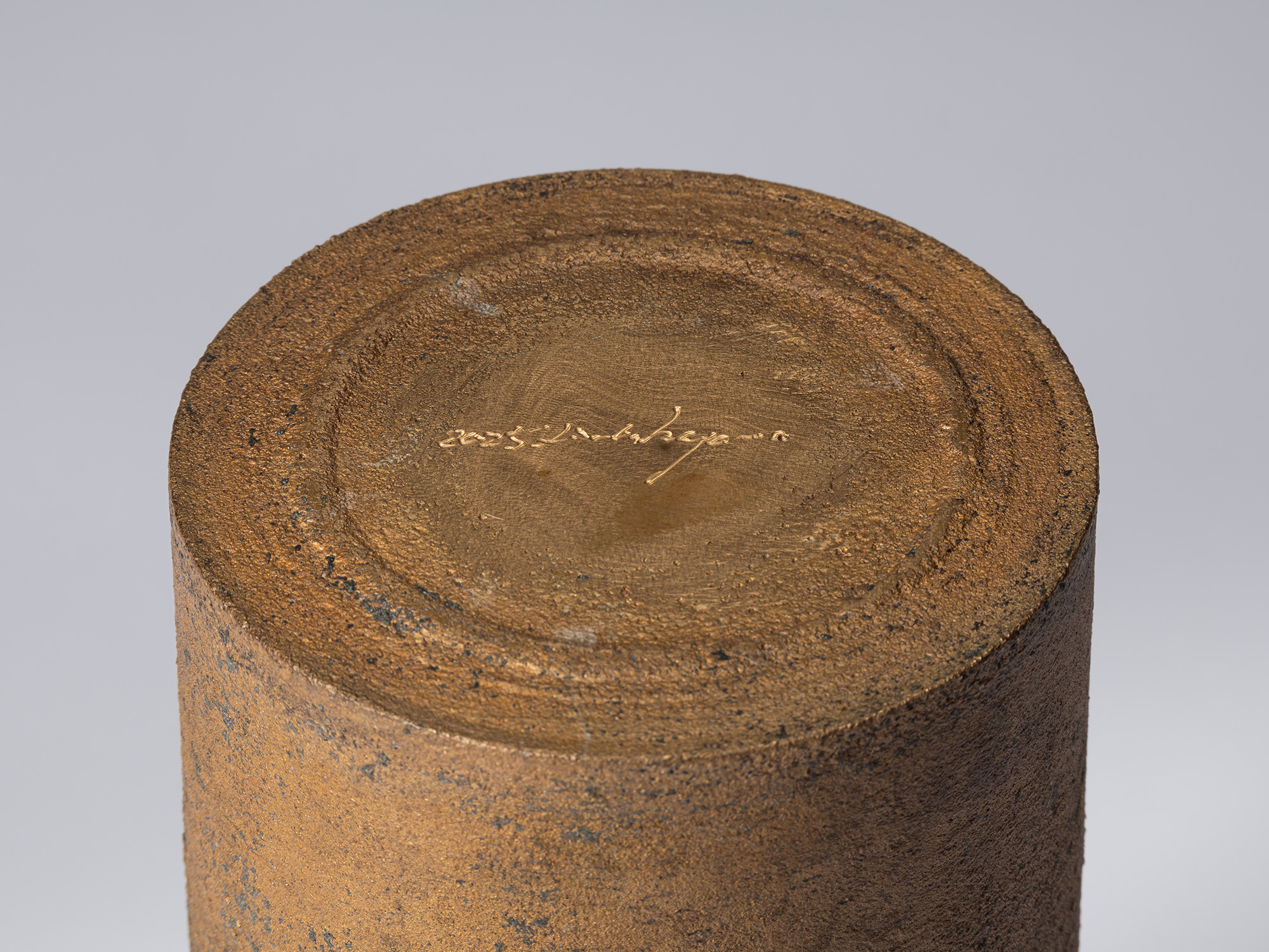 Detail of the underside of Koji Hatakeyama’s bronze as Bronze II No. 26, showing the textured circular...